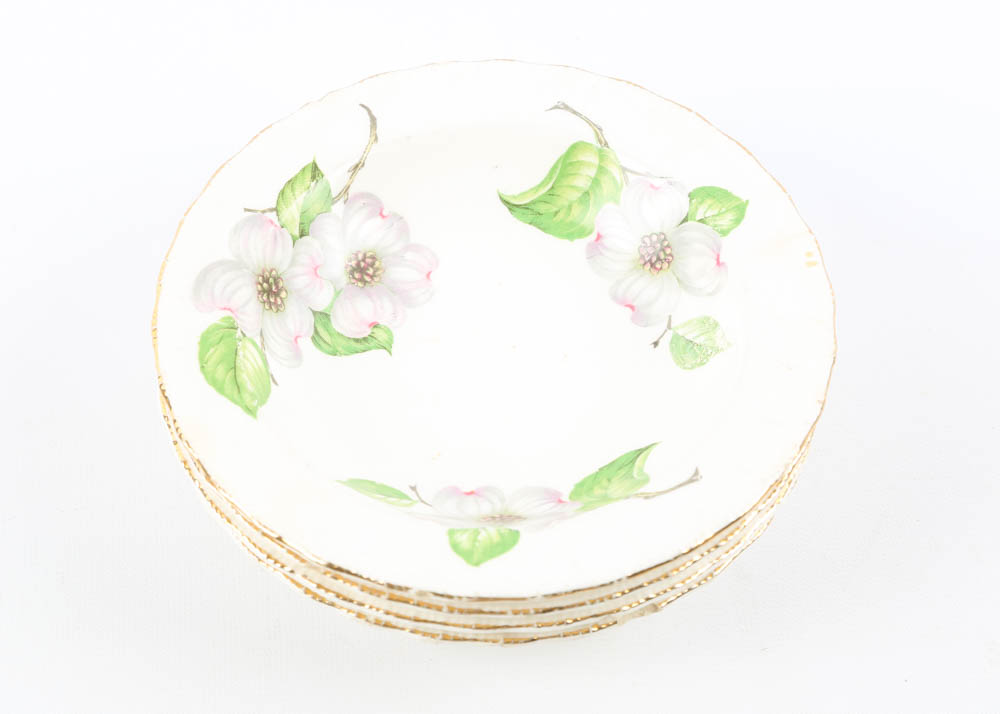 Large Assortment of Mismatched China Plates and Serving Pieces