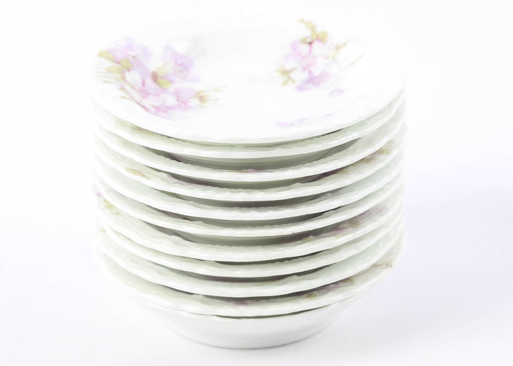 Large Assortment of Mismatched China Plates and Serving Pieces