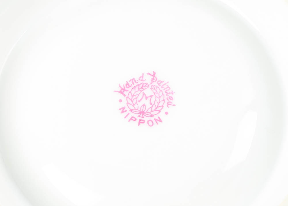 Large Assortment of Mismatched China Plates and Serving Pieces