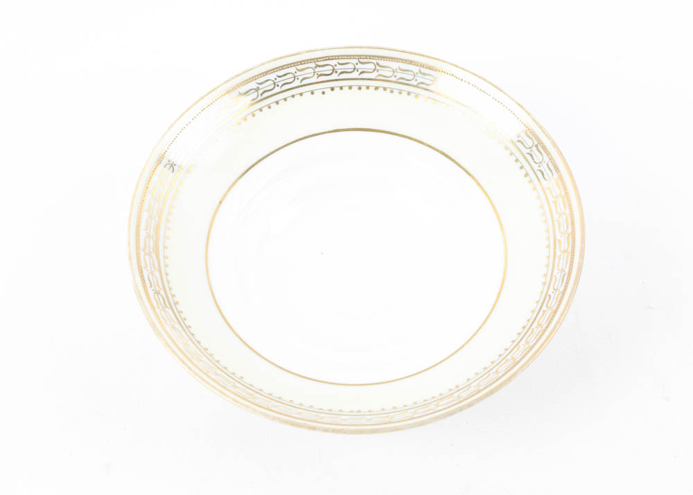 Large Assortment of Mismatched China Plates and Serving Pieces