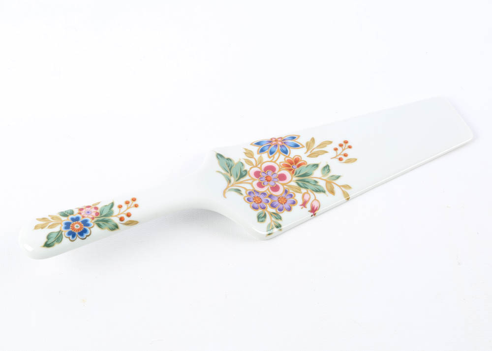 Large Assortment of Mismatched China Plates and Serving Pieces