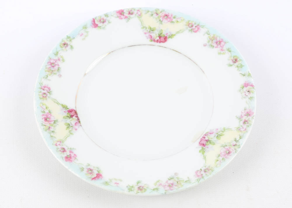 Large Assortment of Mismatched China Plates and Serving Pieces