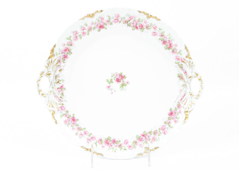 Large Assortment of Mismatched China Plates and Serving Pieces