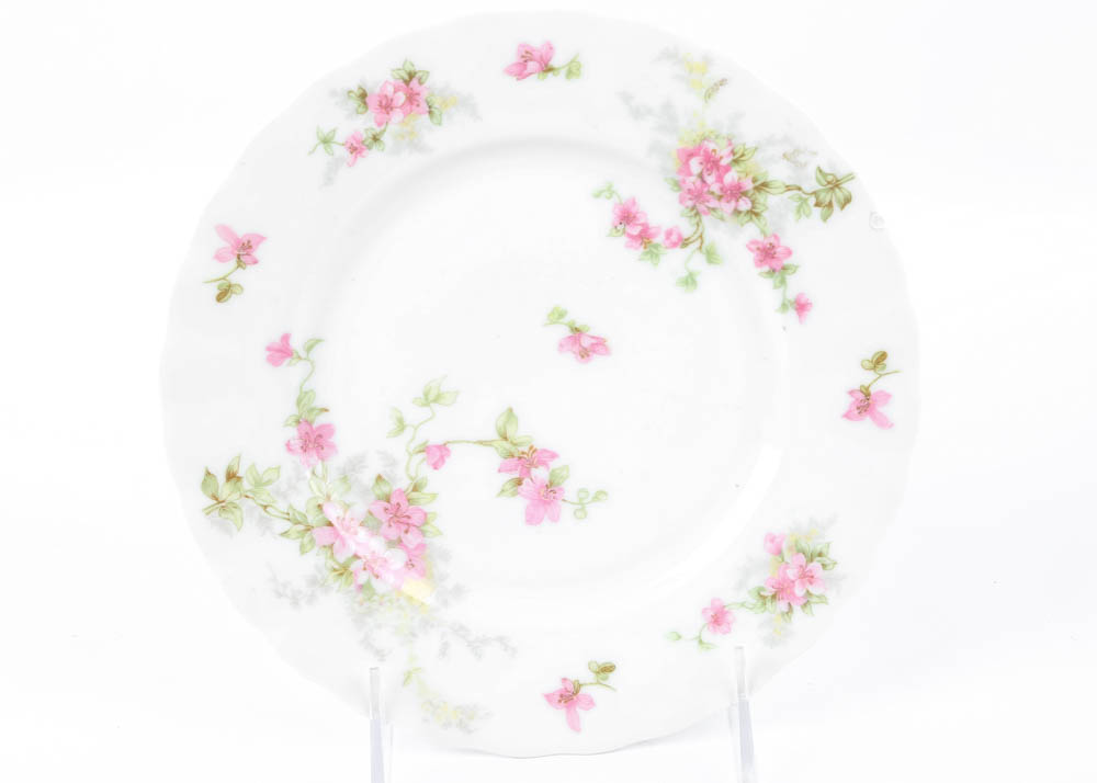 Large Assortment of Mismatched China Plates and Serving Pieces