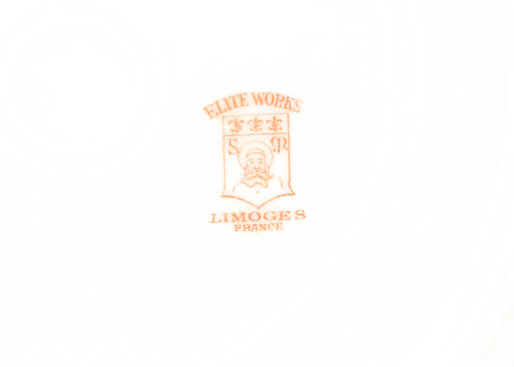 Large Assortment of Mismatched China Plates and Serving Pieces