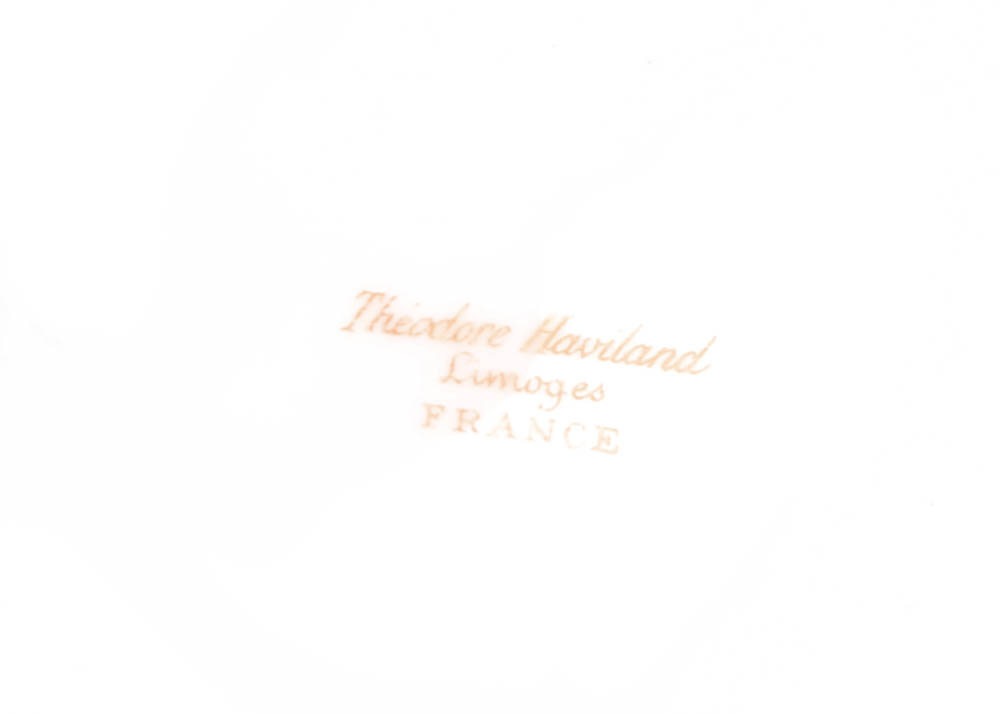 Large Assortment of Mismatched China Plates and Serving Pieces