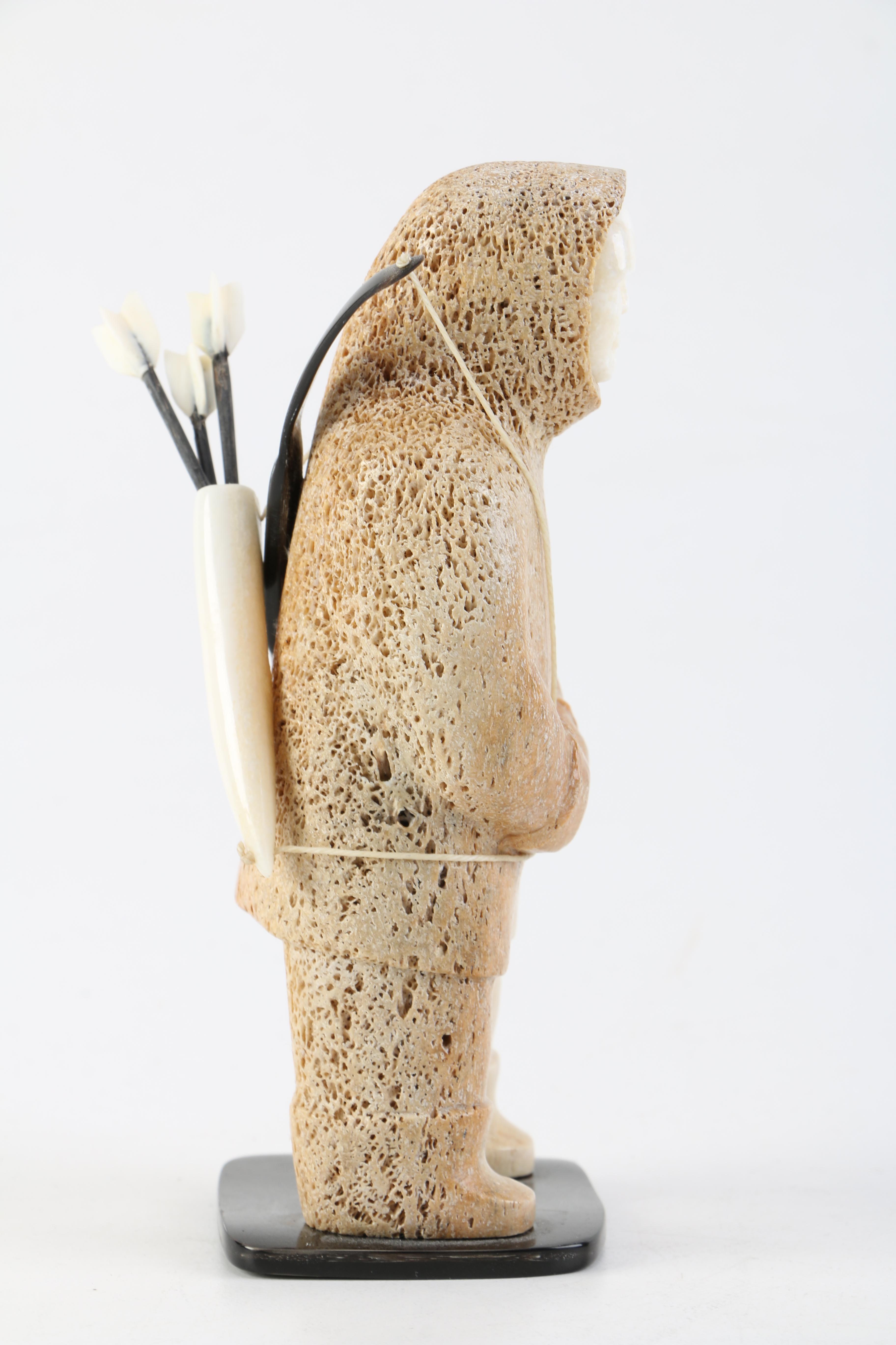 Inuit Decorative Arts Walrus Bone and Ivory Figurine