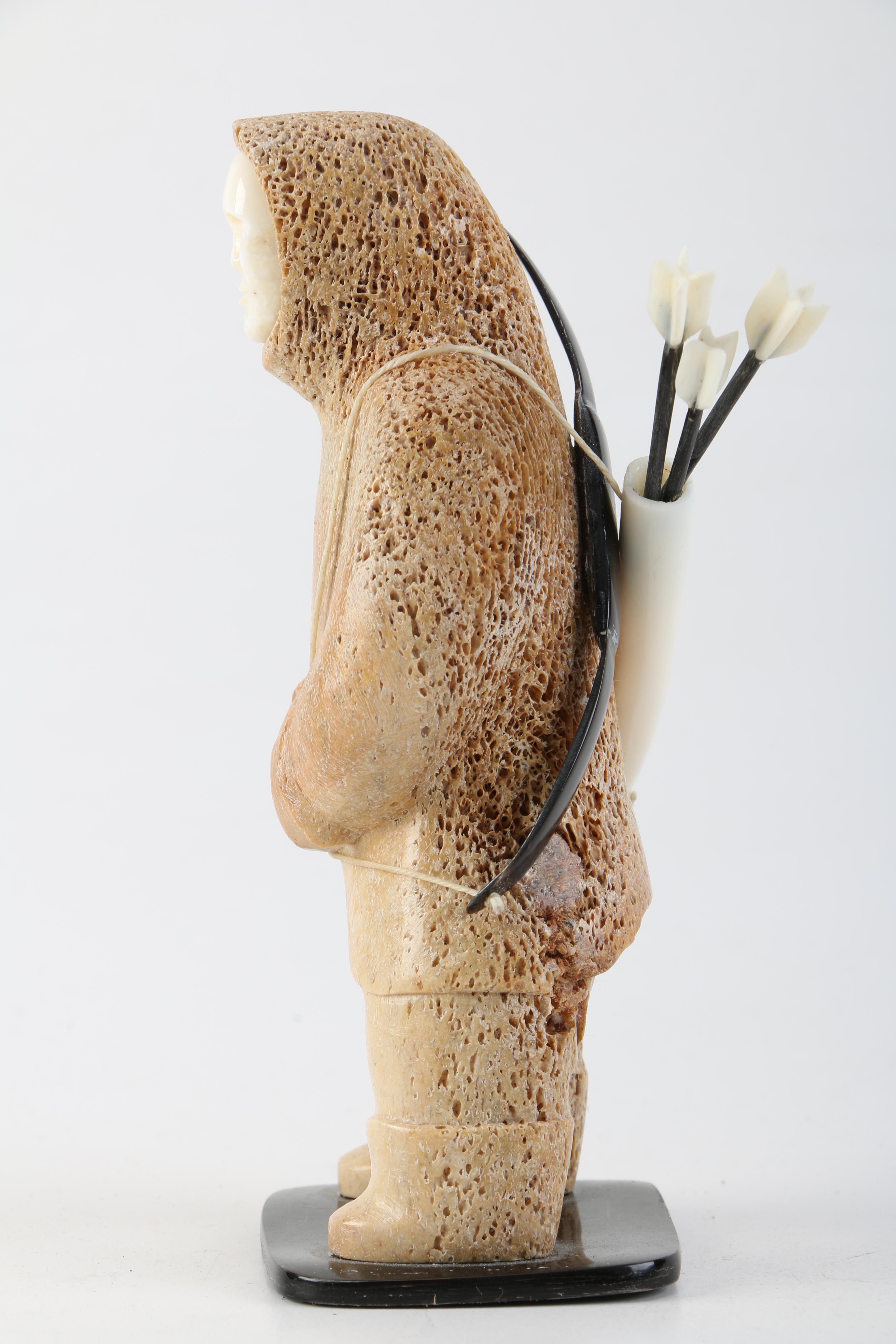 Inuit Decorative Arts Walrus Bone and Ivory Figurine