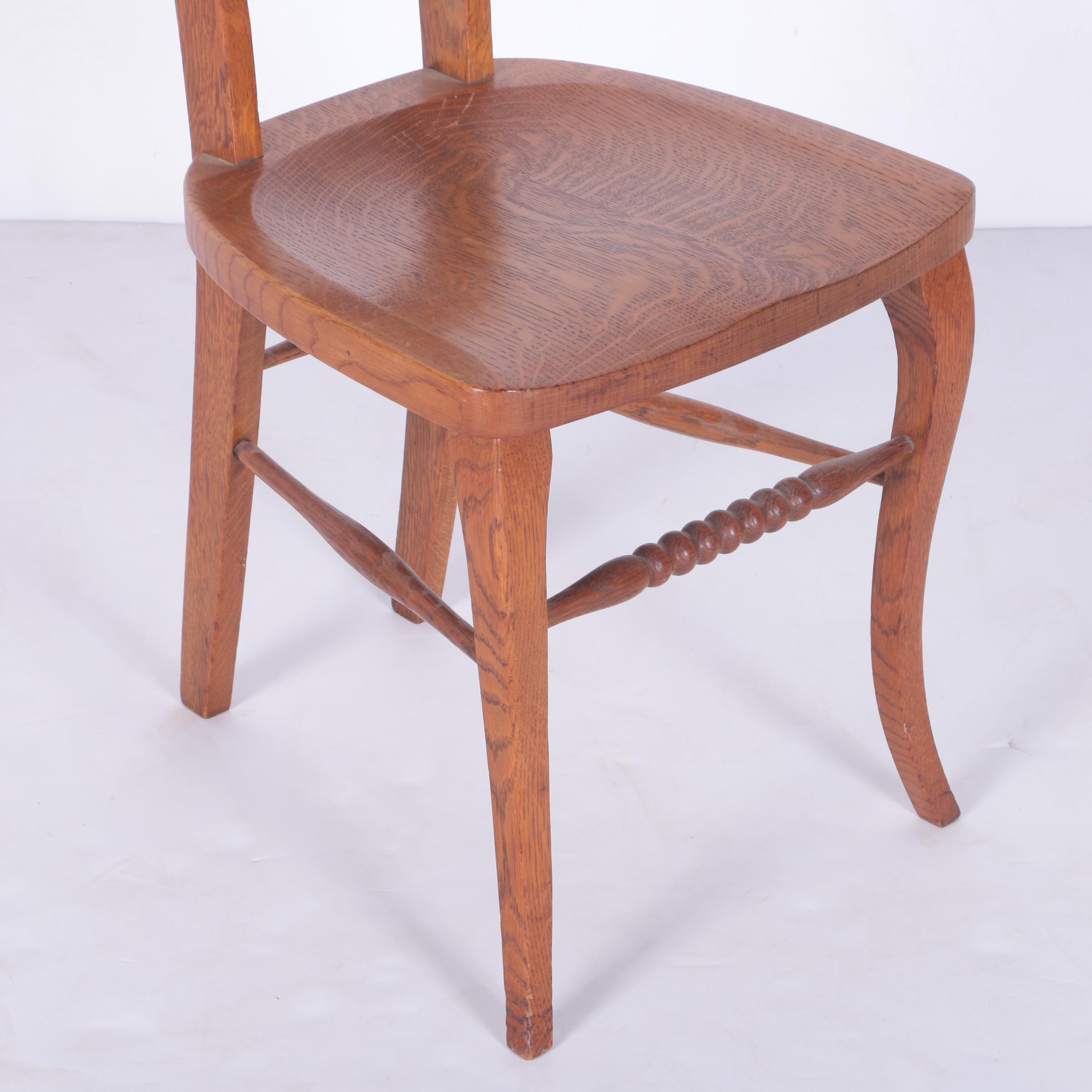 North Wind Carved Oak Chair