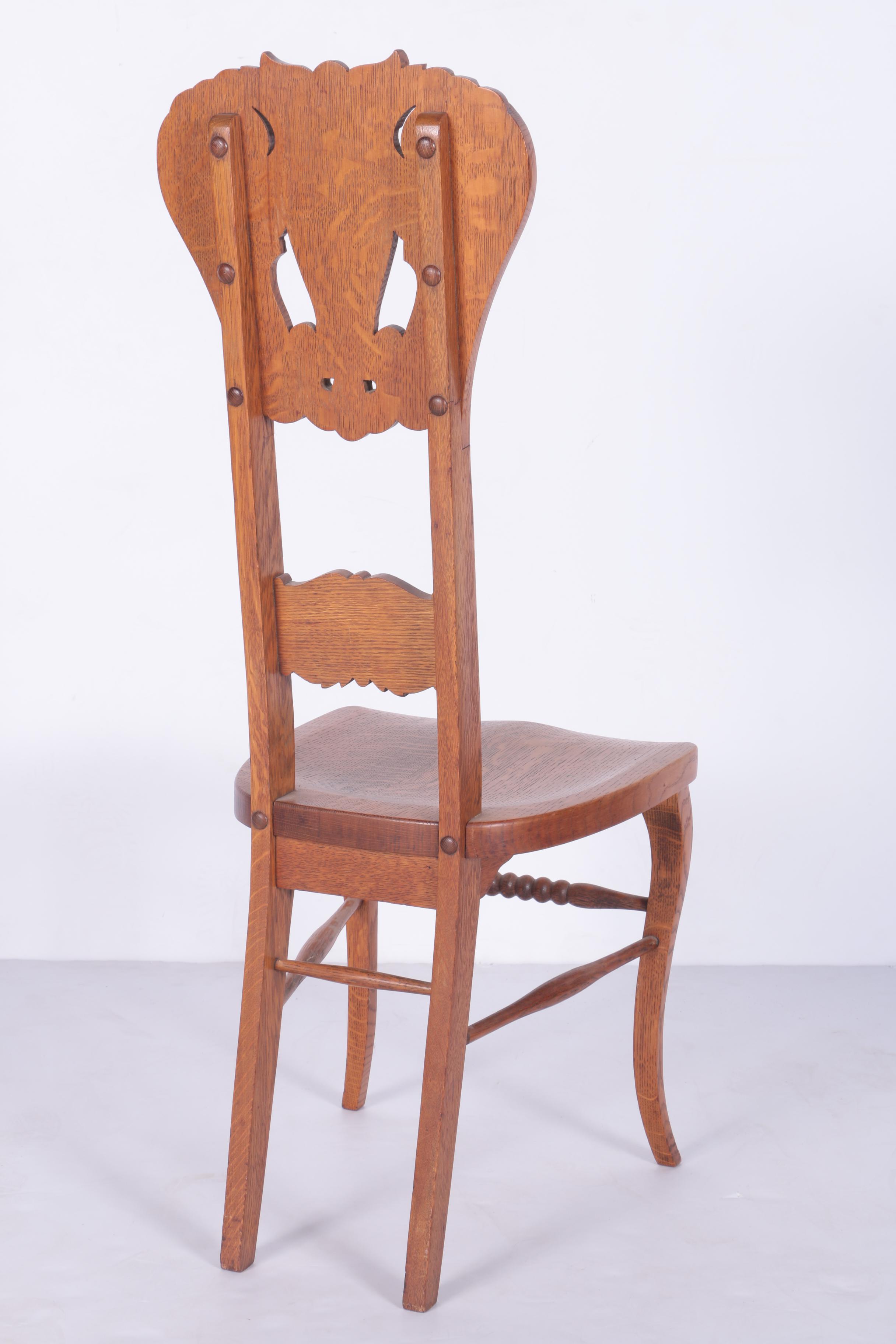 North Wind Carved Oak Chair