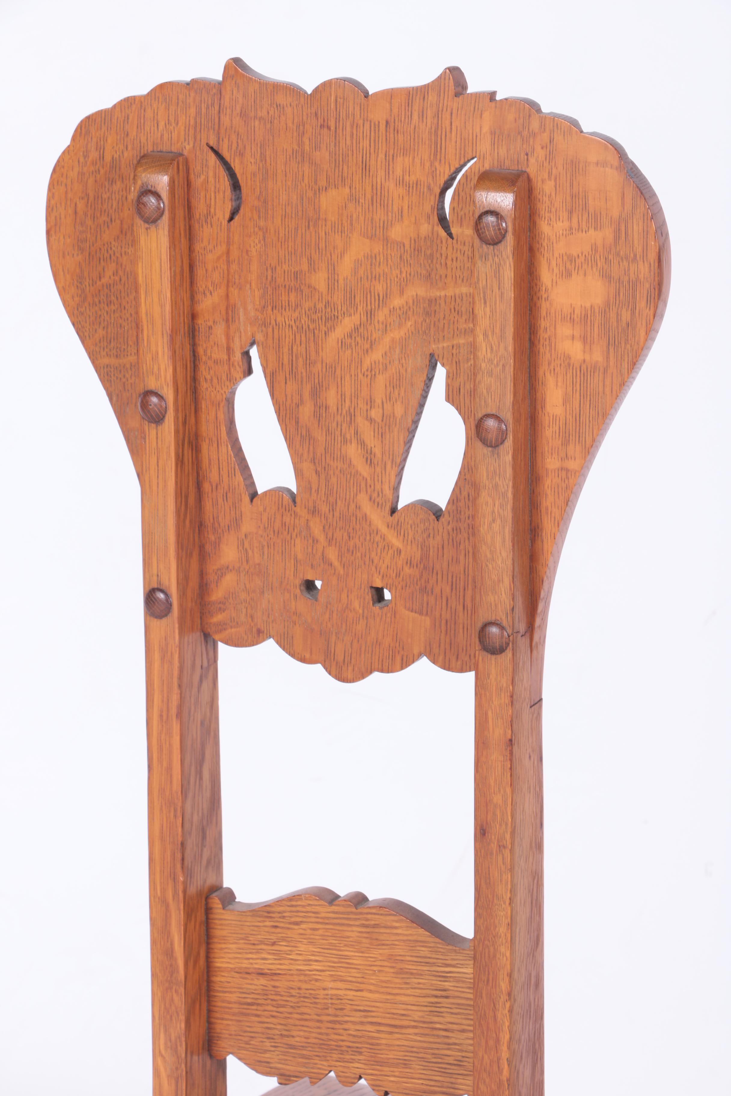 North Wind Carved Oak Chair