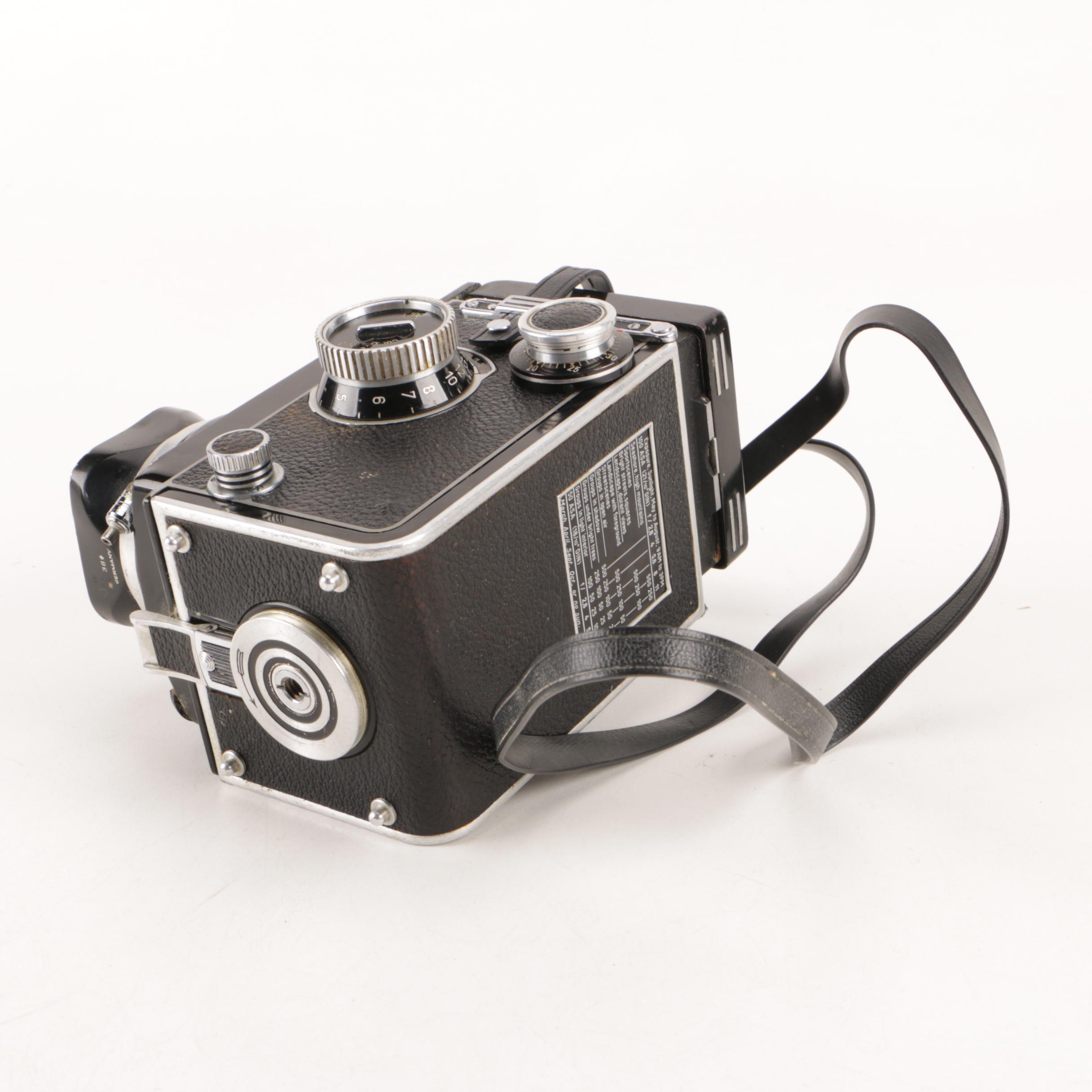 Vintage Rolleiflex Camera and Sunpak Flash