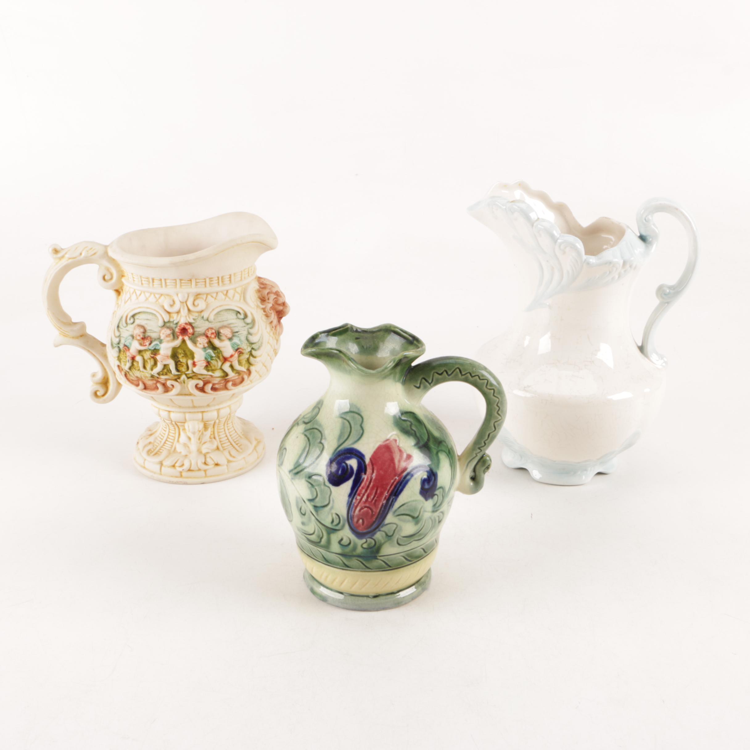 Capodimonte Style Cherub Pitcher and Ceramic Pitchers