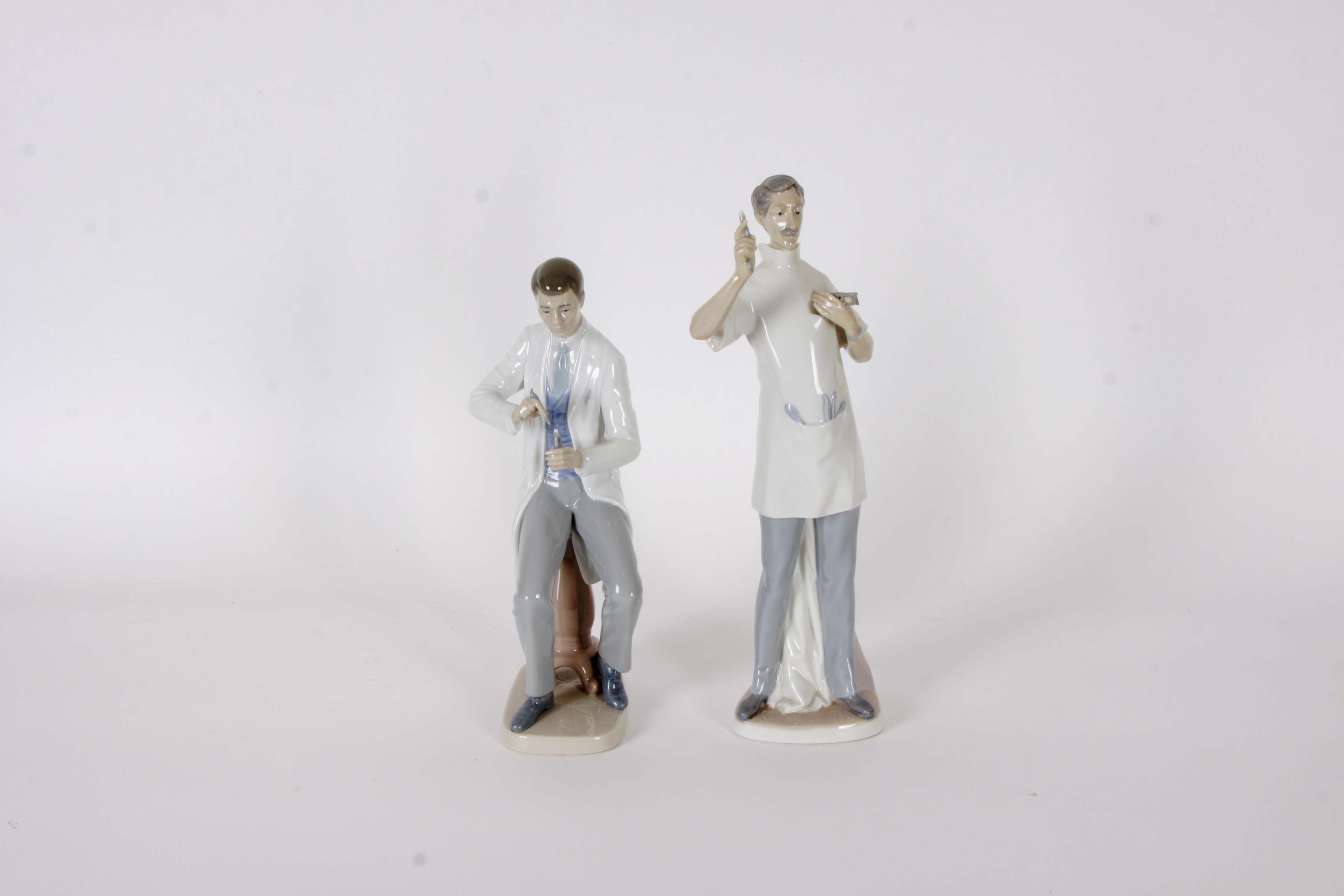 Pair of Lladro "Dentist" Figurines