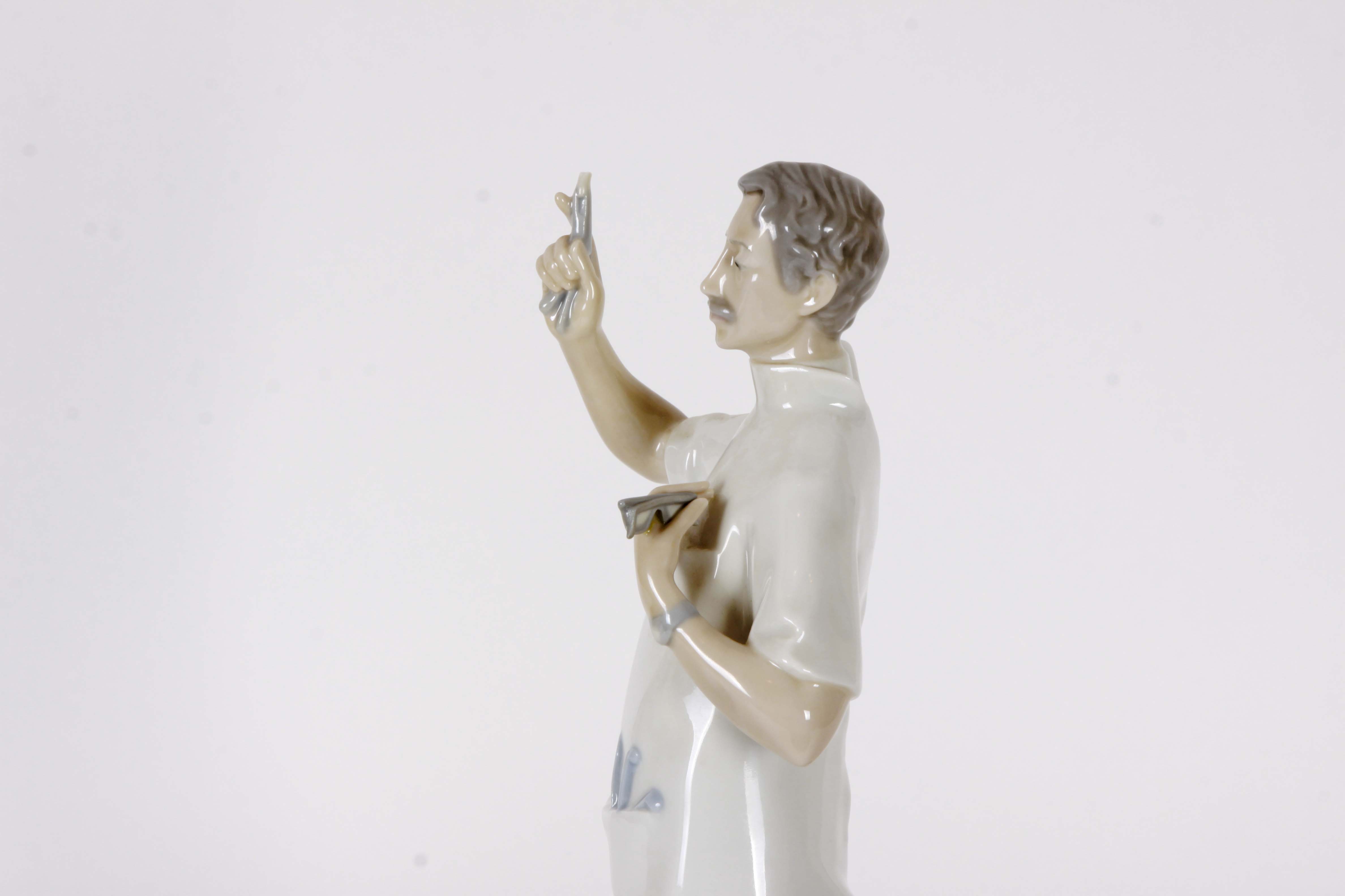 Pair of Lladro "Dentist" Figurines