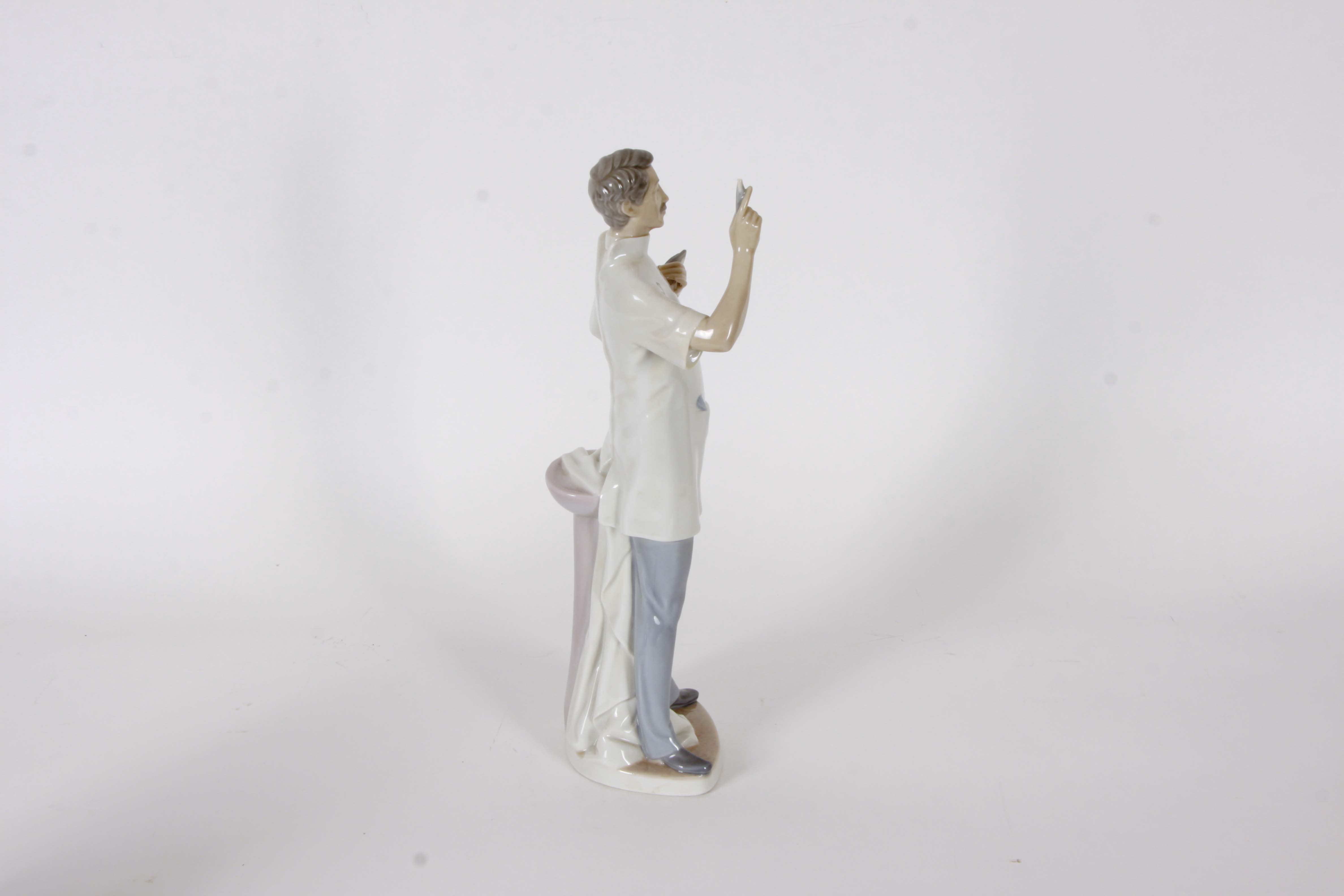 Pair of Lladro "Dentist" Figurines