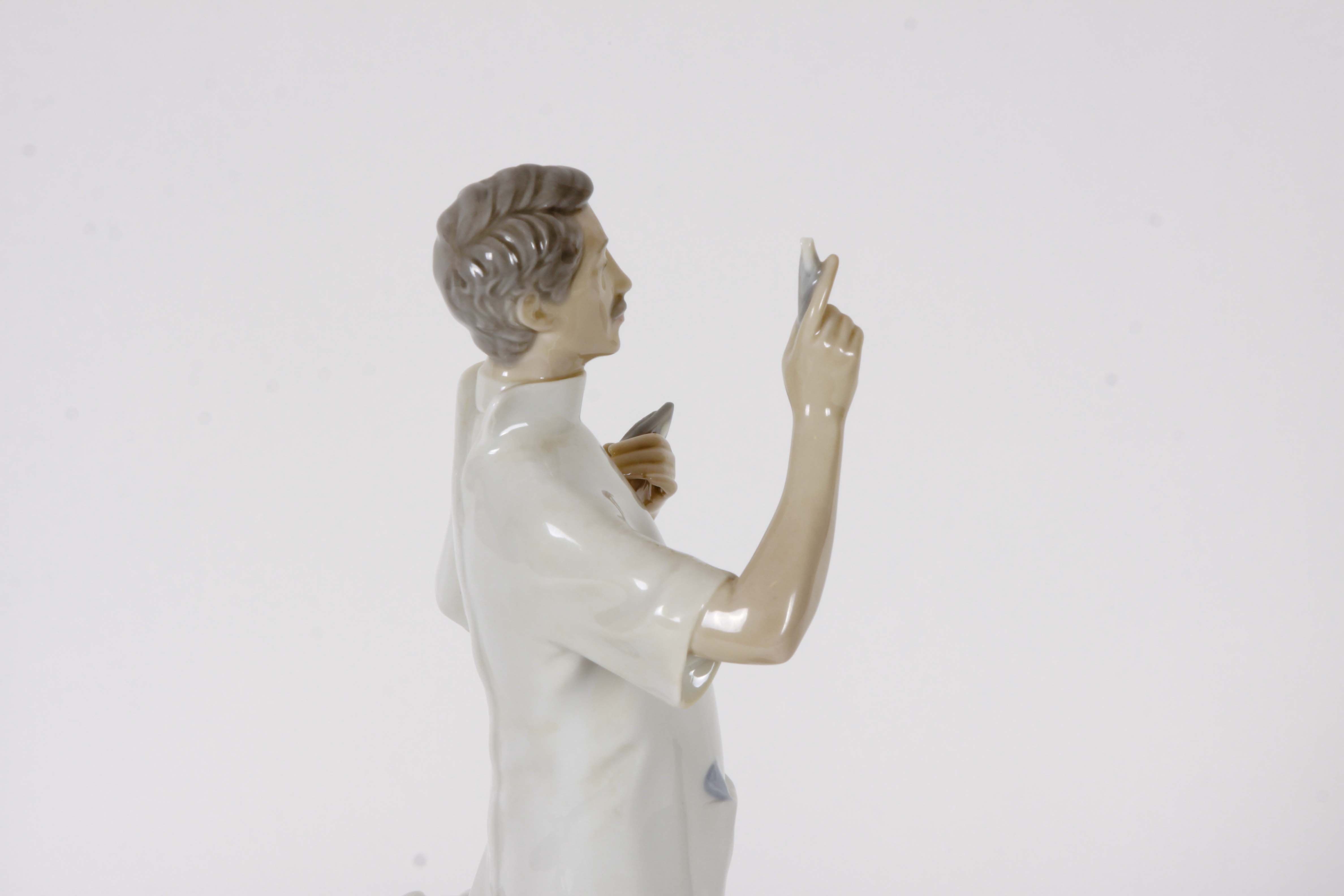 Pair of Lladro "Dentist" Figurines