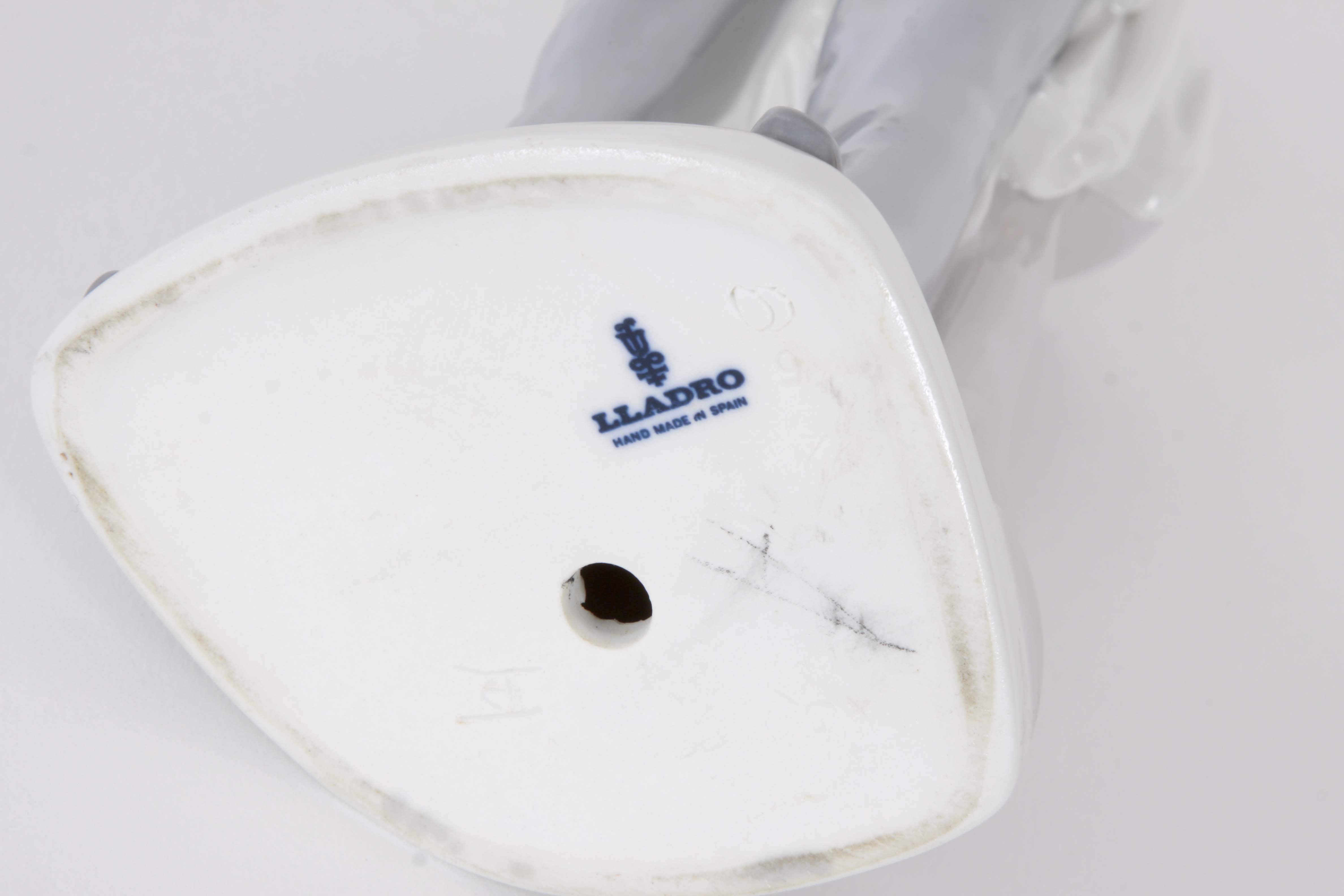 Pair of Lladro "Dentist" Figurines