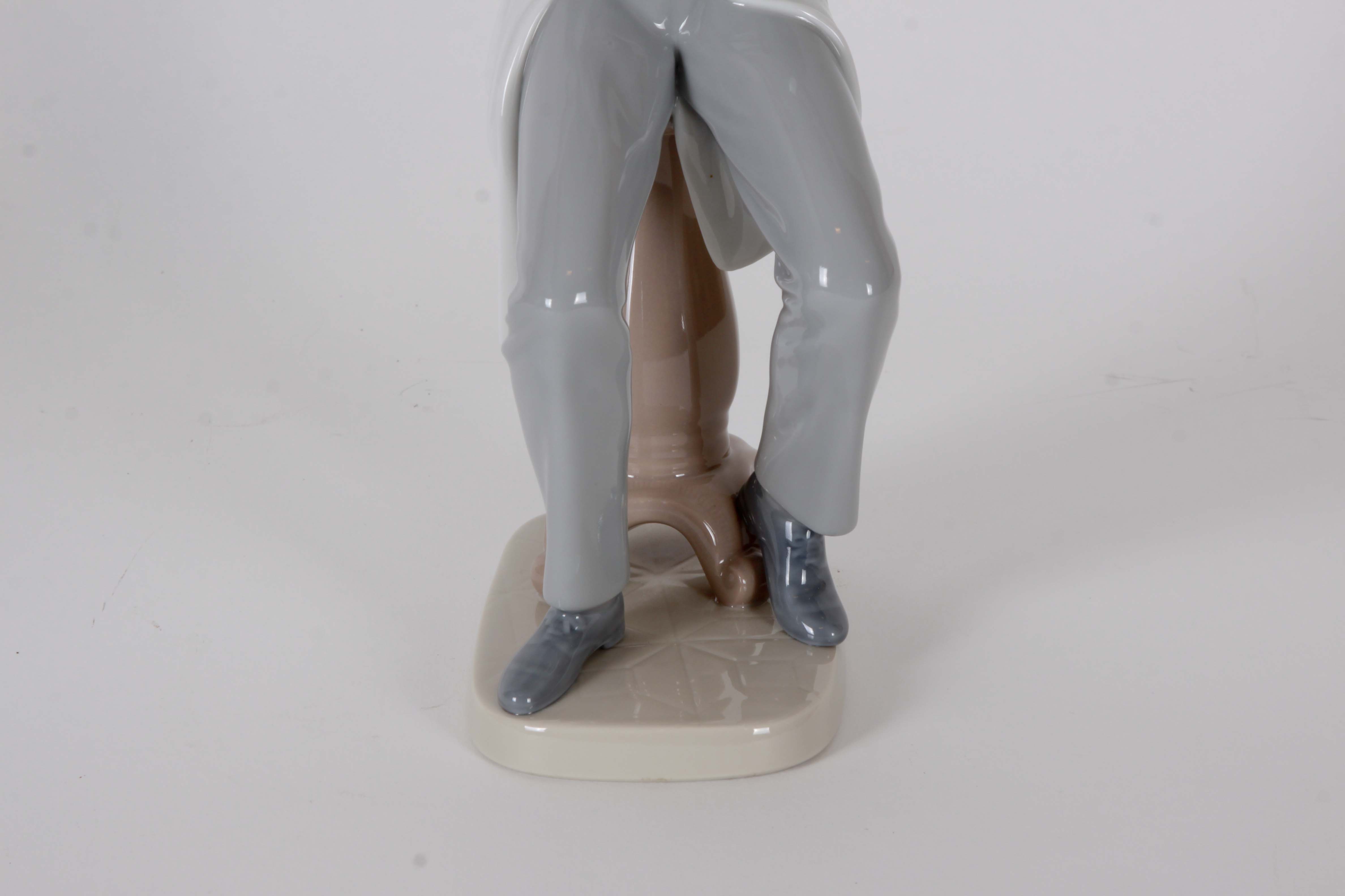 Pair of Lladro "Dentist" Figurines