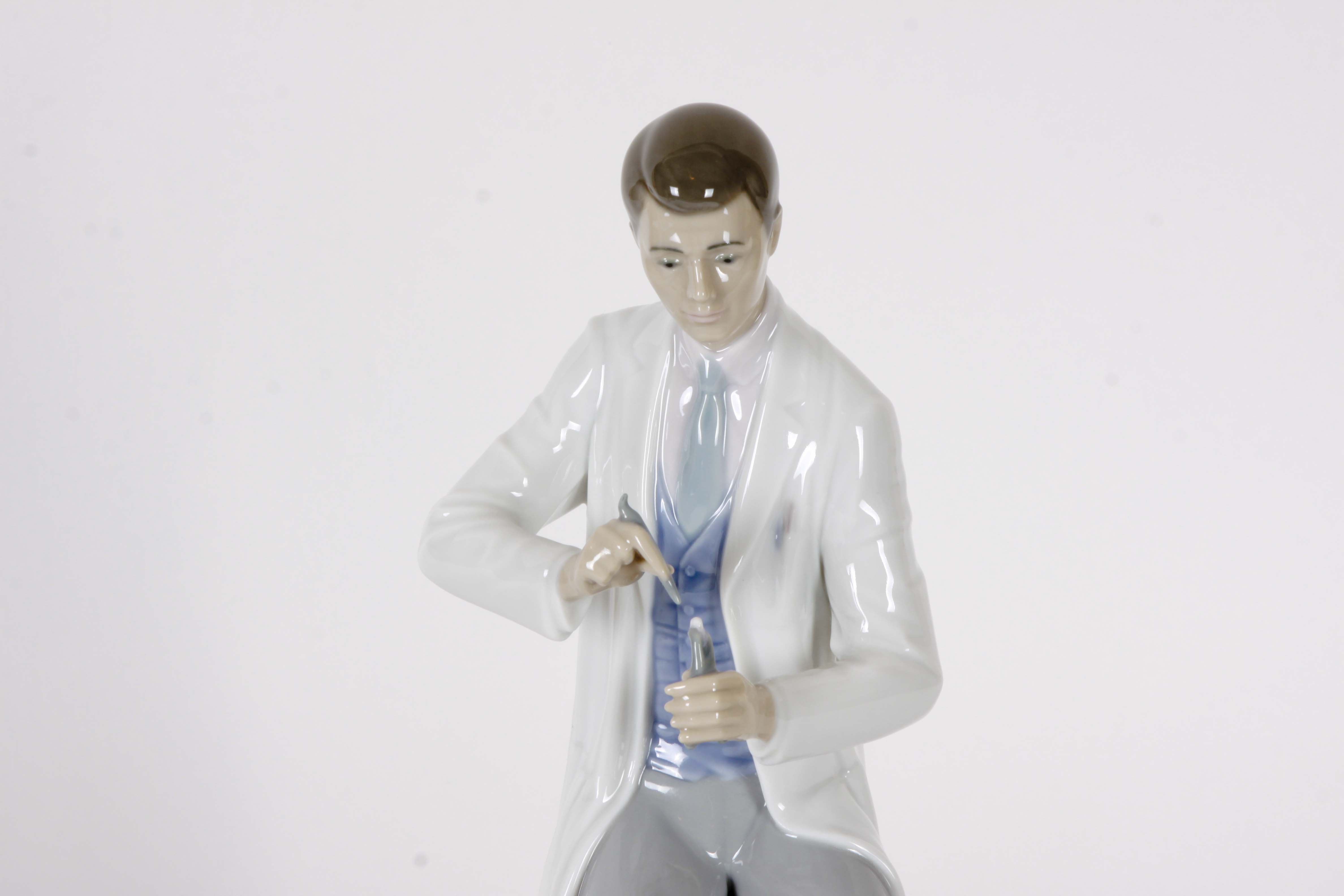 Pair of Lladro "Dentist" Figurines