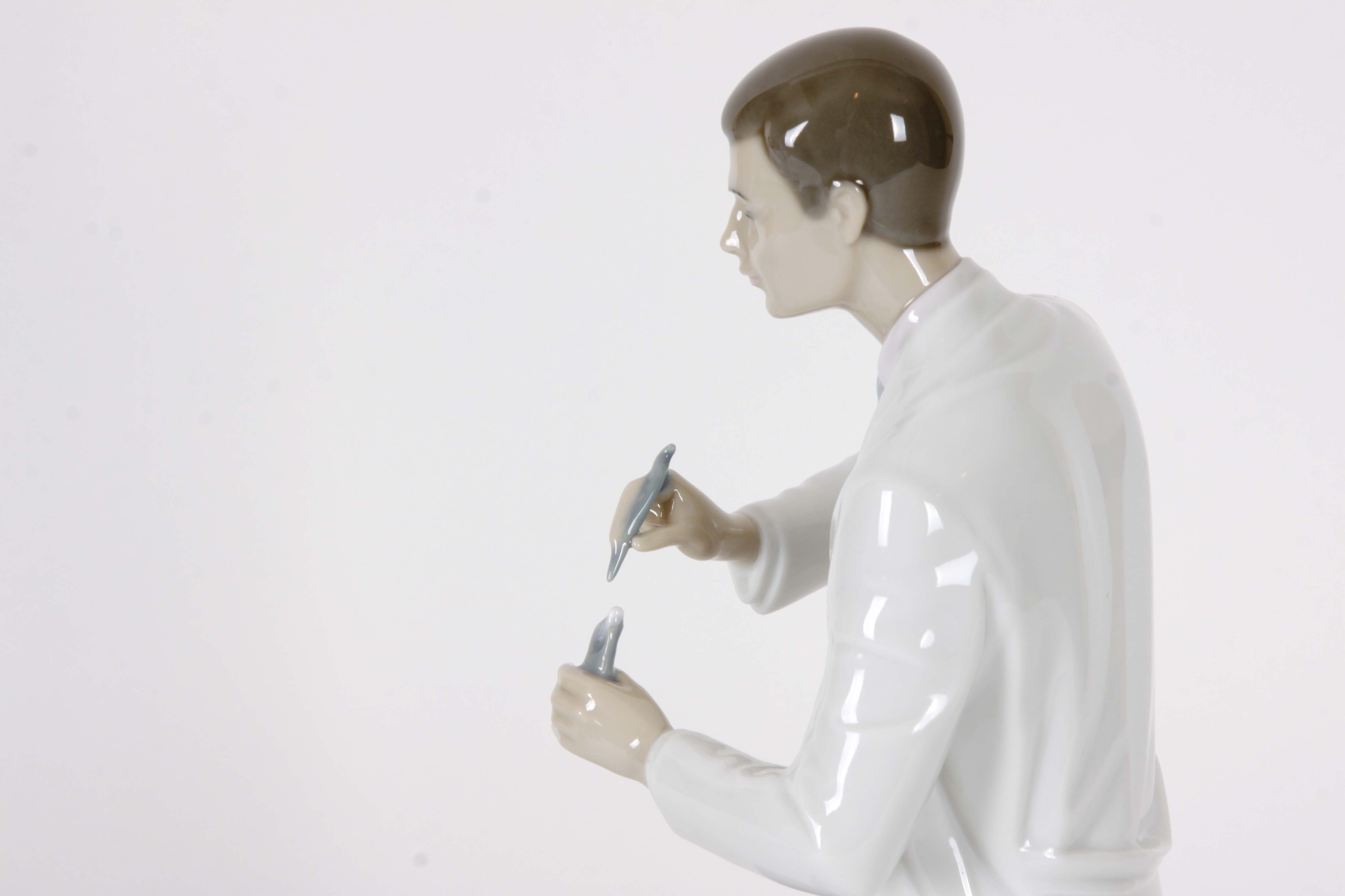 Pair of Lladro "Dentist" Figurines