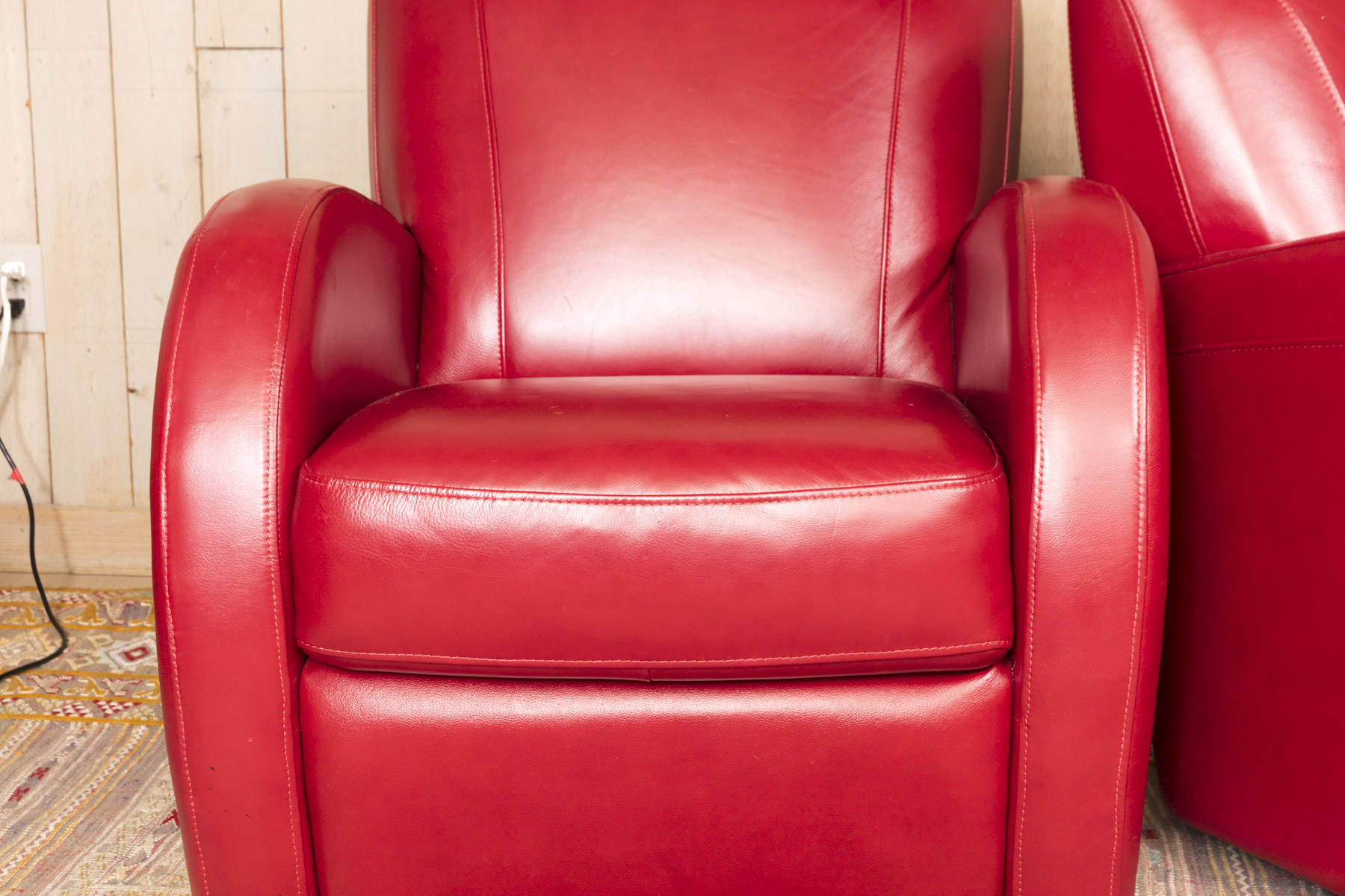 Pair of Red Leather Club Chairs by Superb Creation Ltd.
