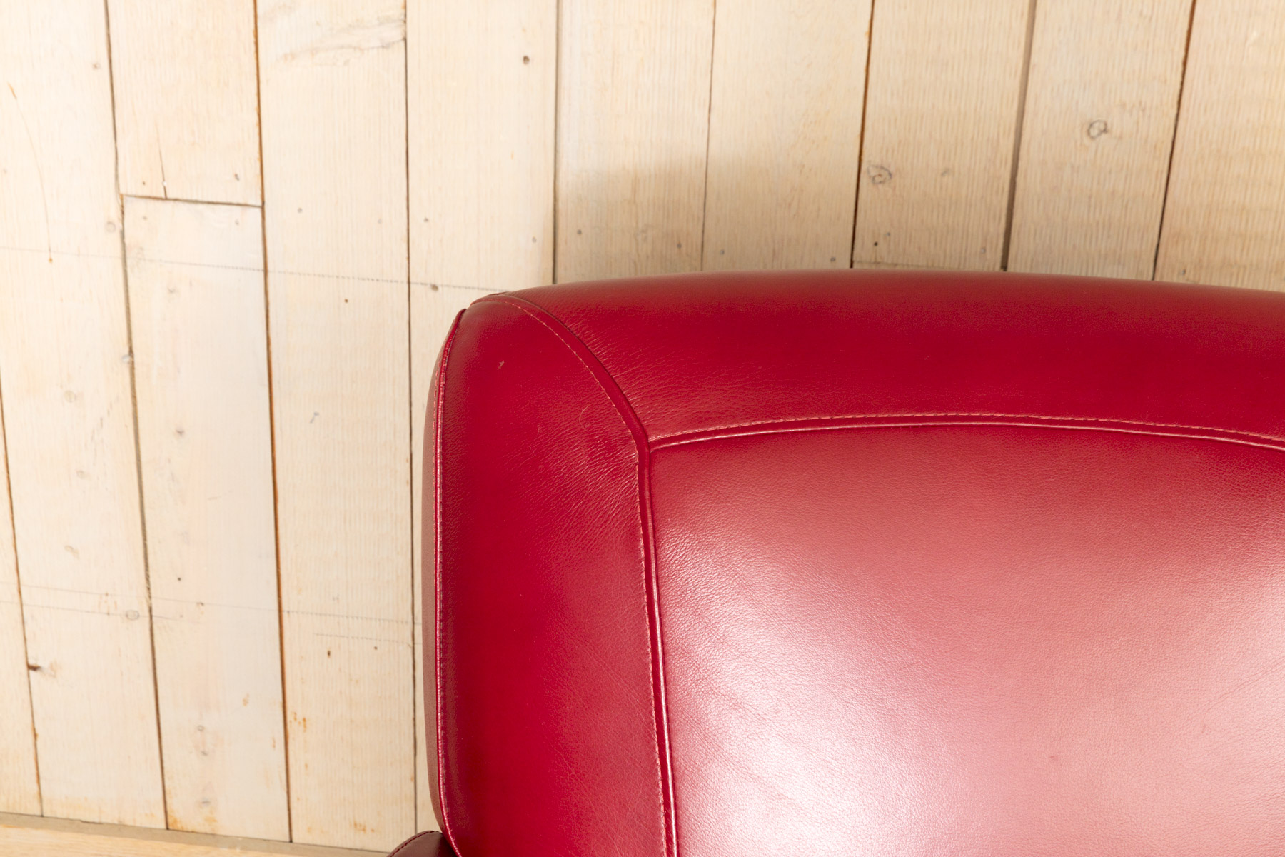 Pair of Red Leather Club Chairs by Superb Creation Ltd.