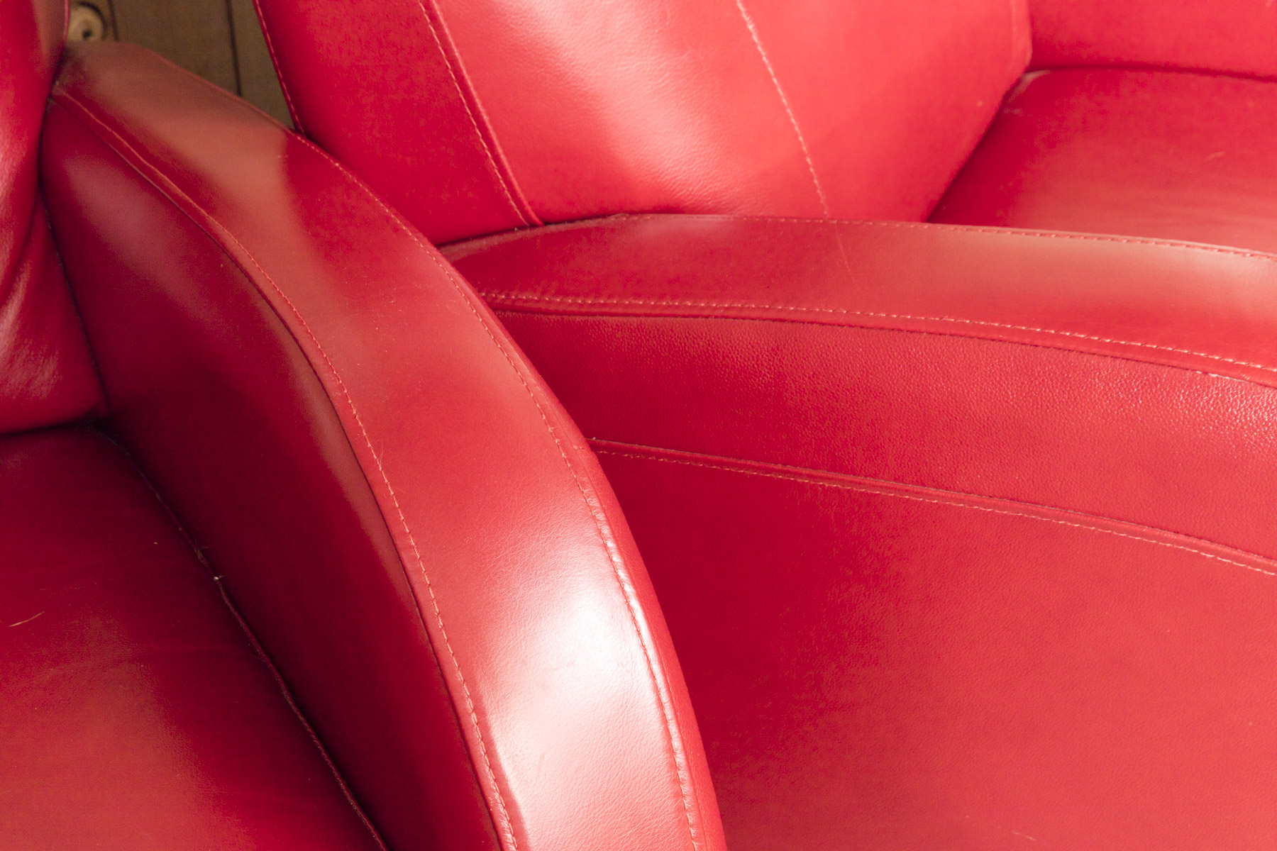 Pair of Red Leather Club Chairs by Superb Creation Ltd.