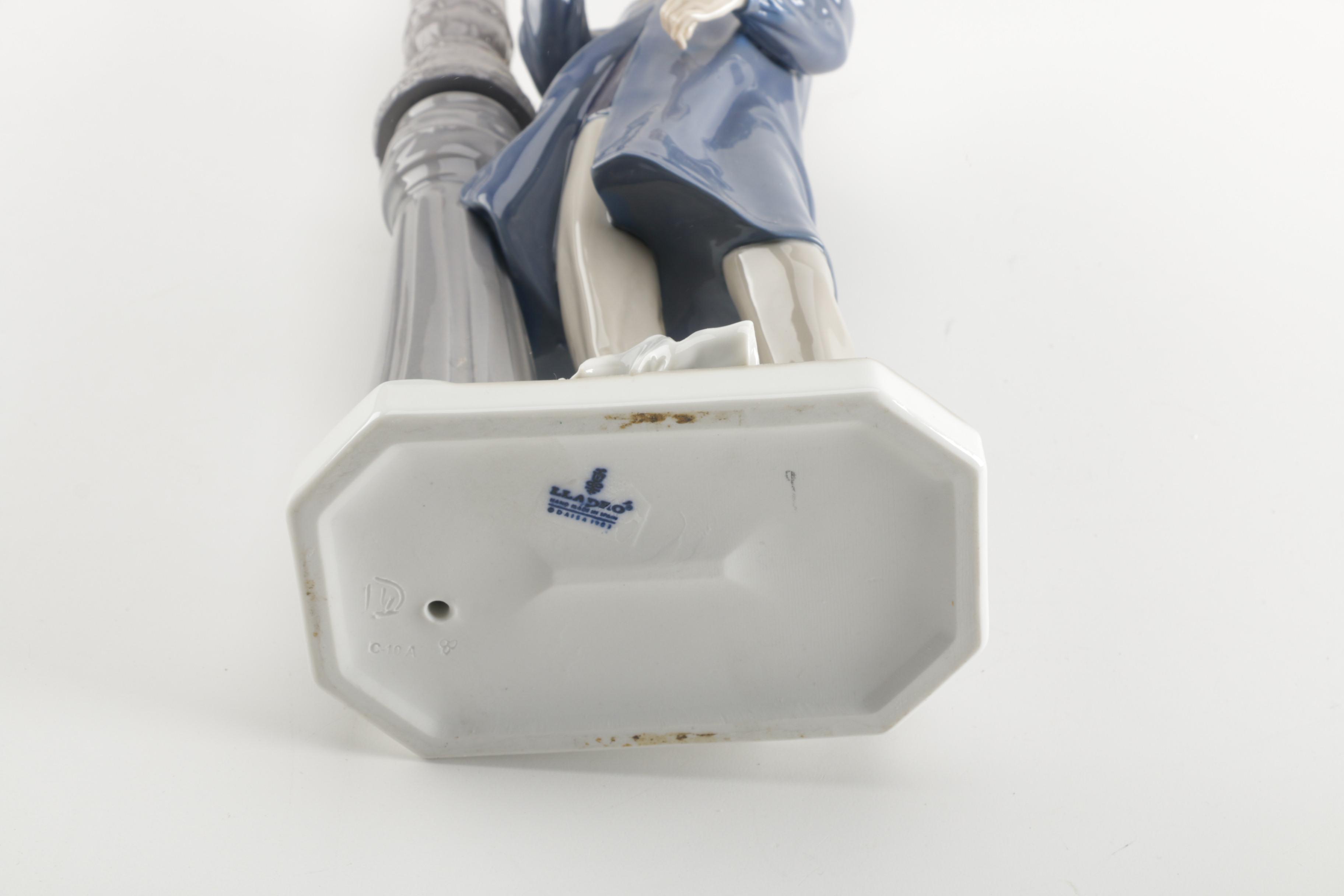 Lladró "Lamplighter" Figurine