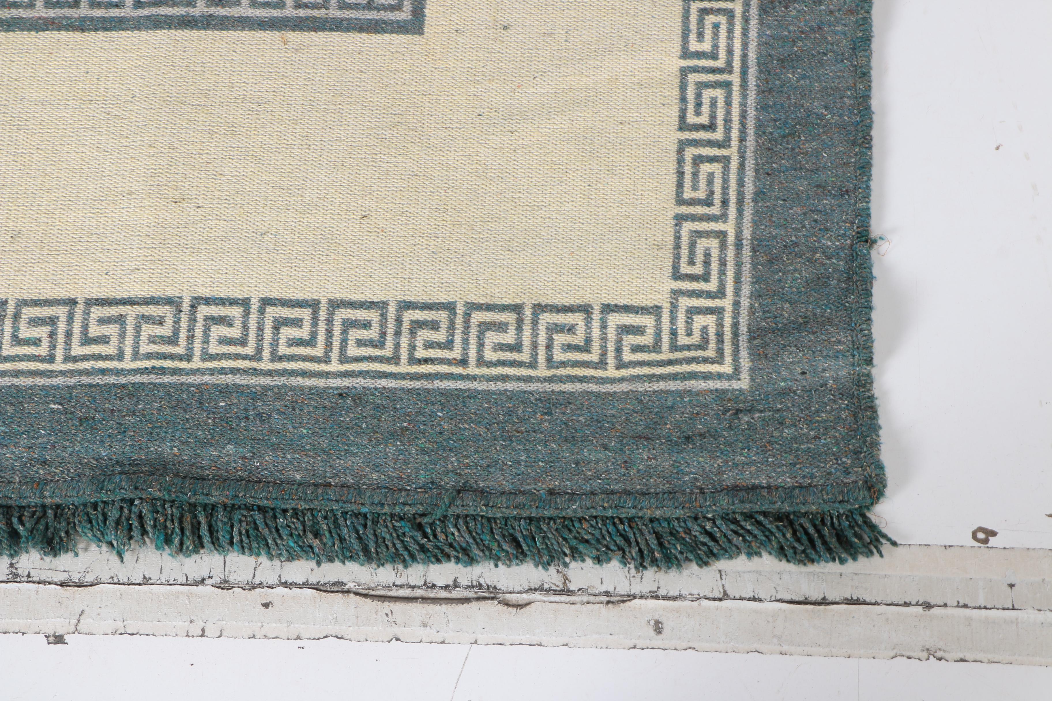 Handwoven Gray and White Meander Motif Area Rug