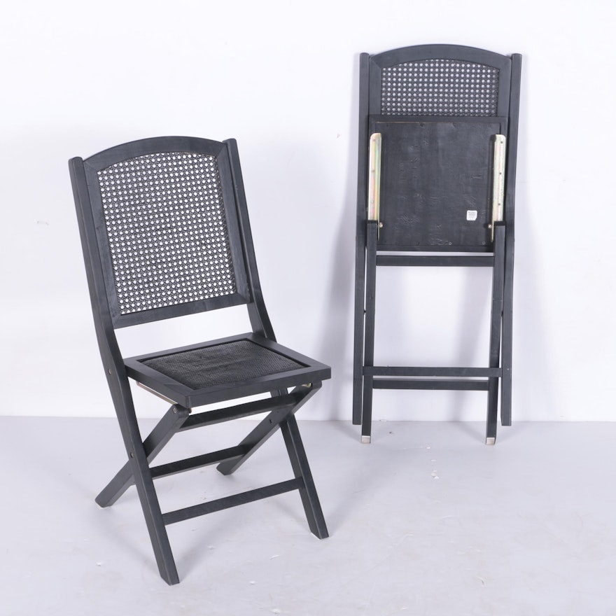 Two Folding Wood Chairs with Caned Backs