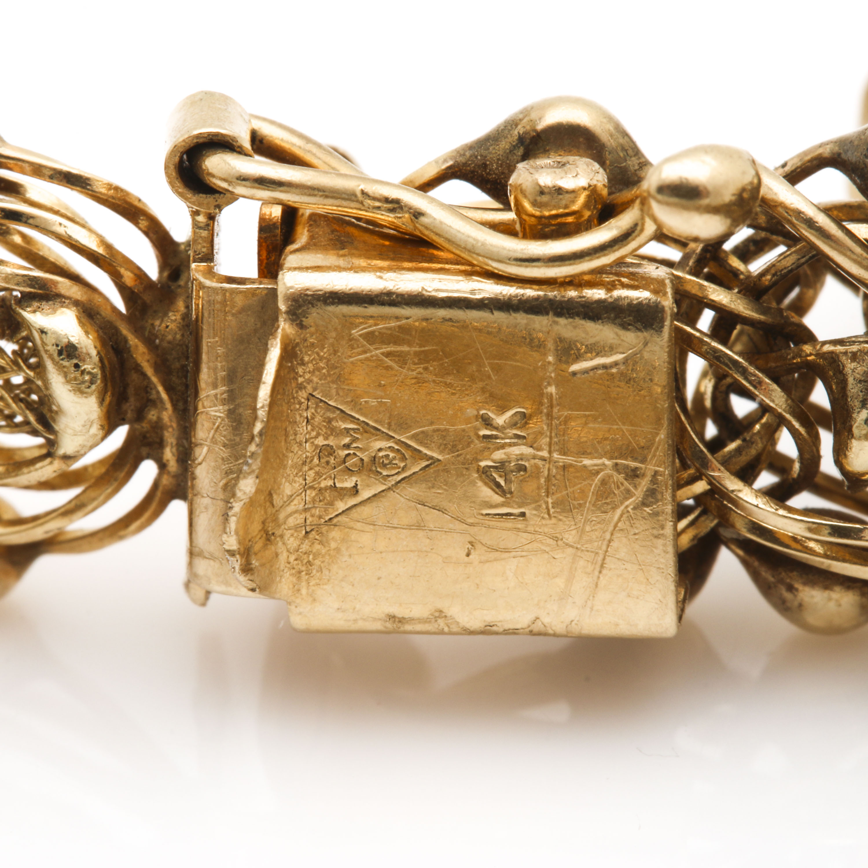 14K, 10K, and 18K Yellow Gold Charm Bracelet Including Gemstones