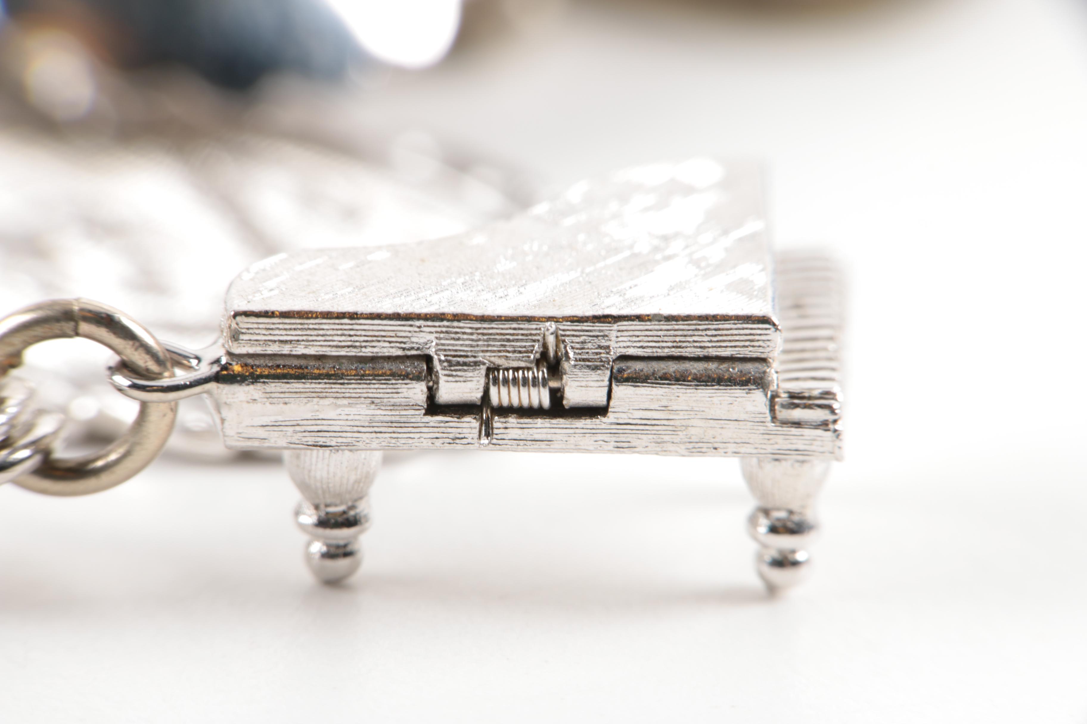 Pair of Sterling Silver Charm Bracelets with Other Loose Charms