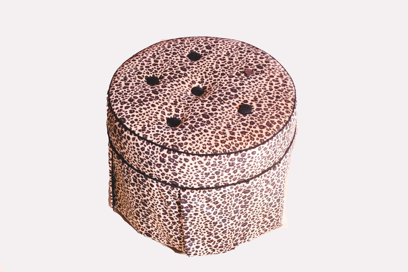 Child's Armchair with Animal Print Pillows and Stool