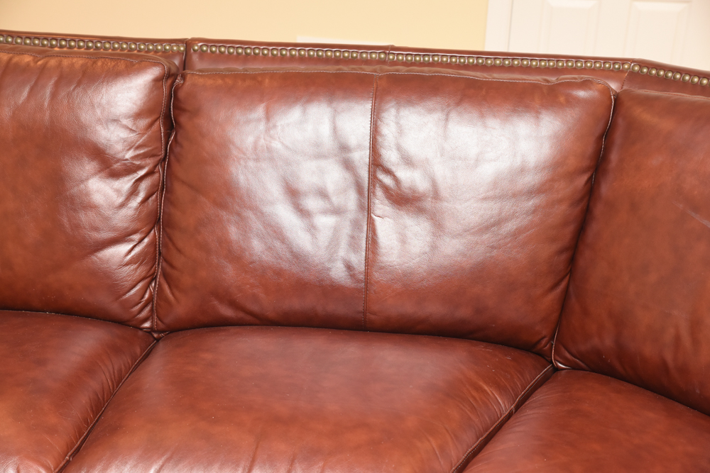 Brown Leather Curved Sectional Sofa with Ottoman by Star Furniture