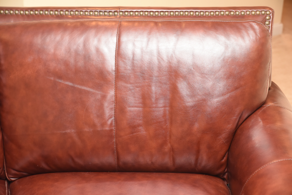 Brown Leather Curved Sectional Sofa with Ottoman by Star Furniture