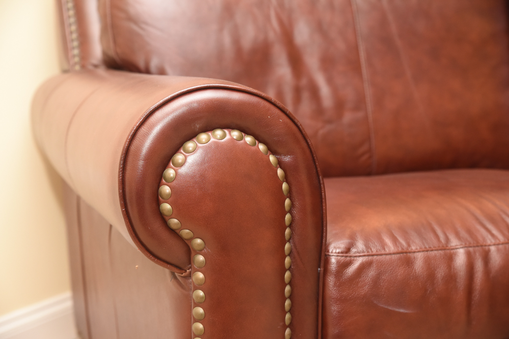 Brown Leather Curved Sectional Sofa with Ottoman by Star Furniture
