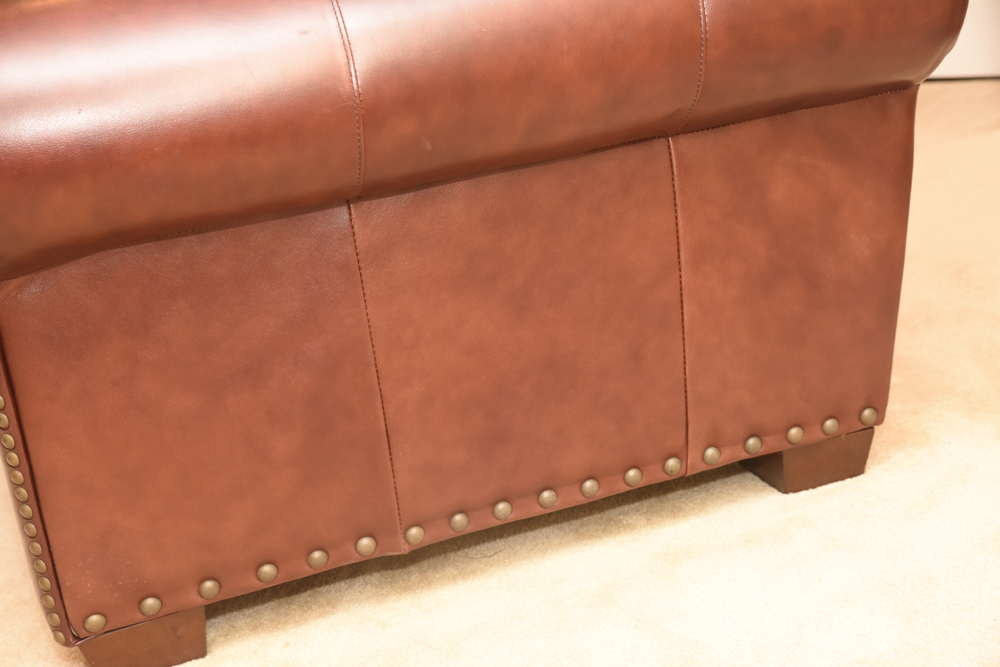 Brown Leather Curved Sectional Sofa with Ottoman by Star Furniture