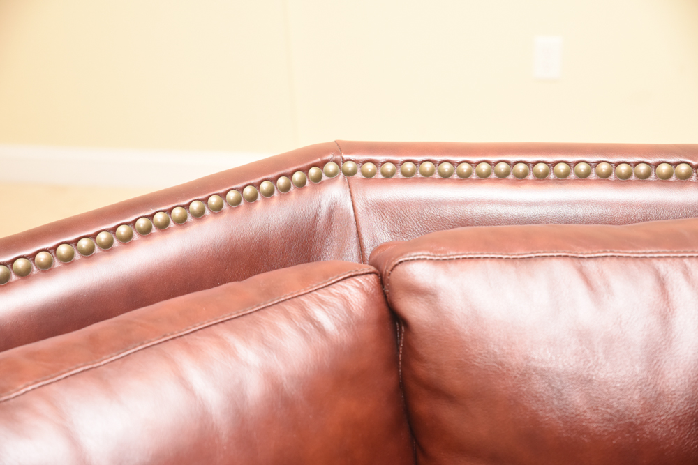Brown Leather Curved Sectional Sofa with Ottoman by Star Furniture