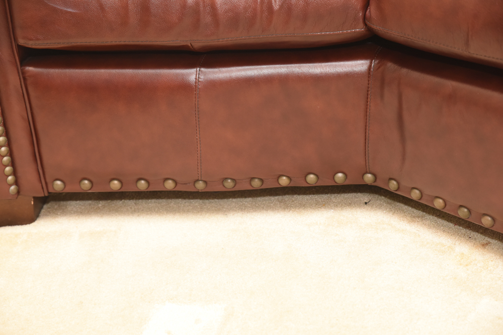 Brown Leather Curved Sectional Sofa with Ottoman by Star Furniture