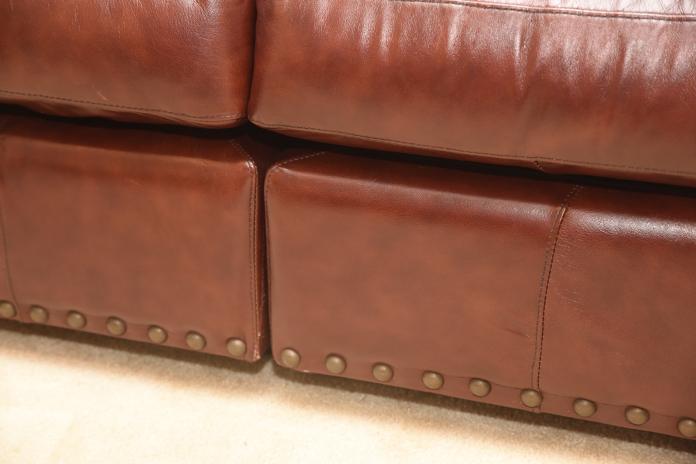 Brown Leather Curved Sectional Sofa with Ottoman by Star Furniture
