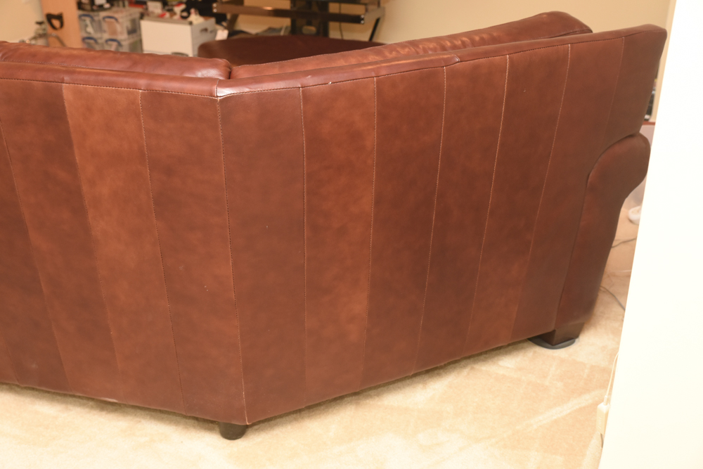 Brown Leather Curved Sectional Sofa with Ottoman by Star Furniture