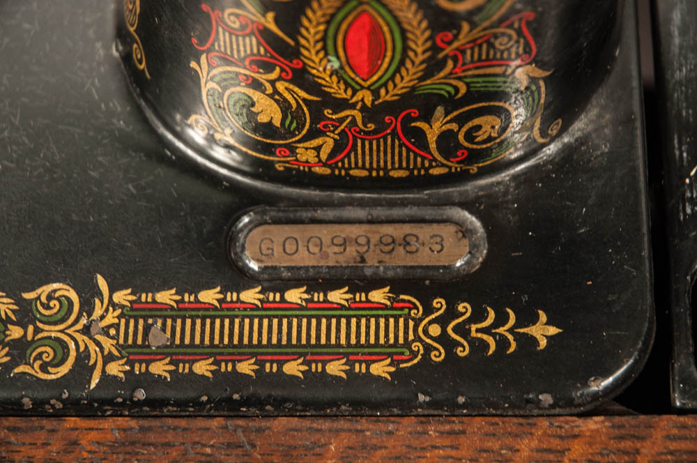 Antique Singer Treadle Sewing Machine in Oak Veneer Cabinet