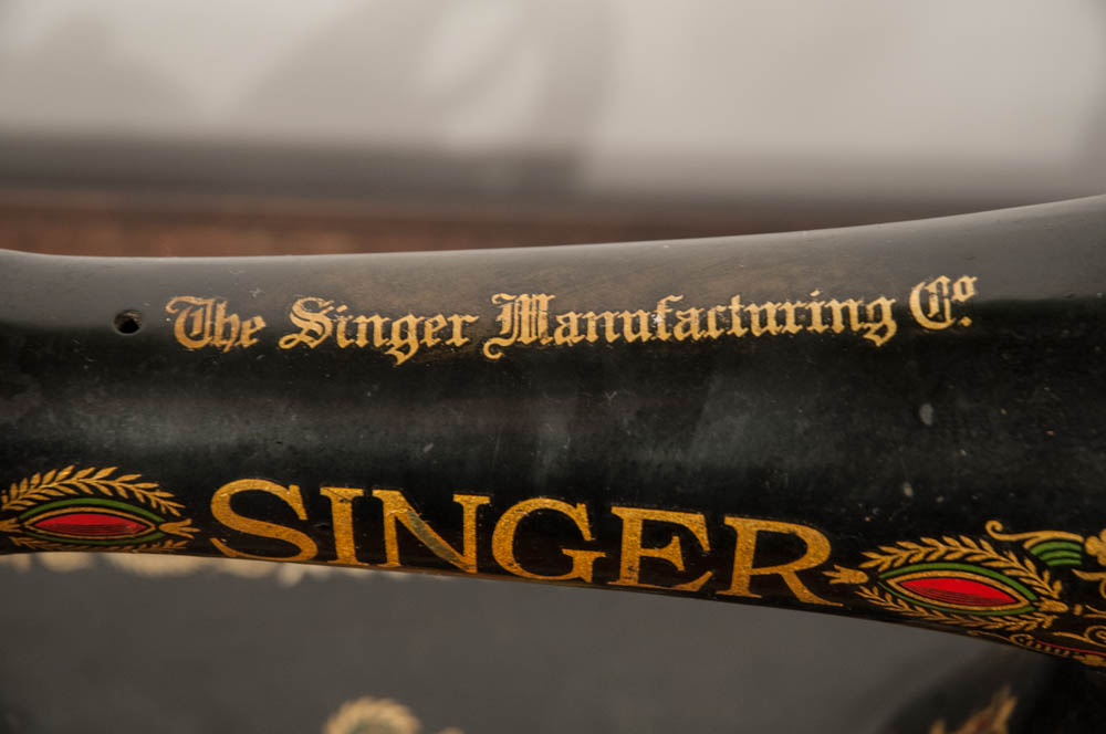 Antique Singer Treadle Sewing Machine in Oak Veneer Cabinet