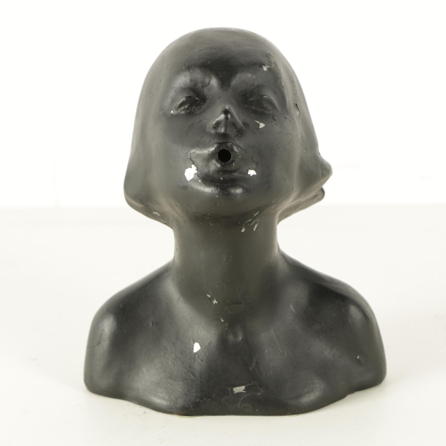 Vintage Cast Lead Alloy Sculpture of a Woman with Pursed Lips