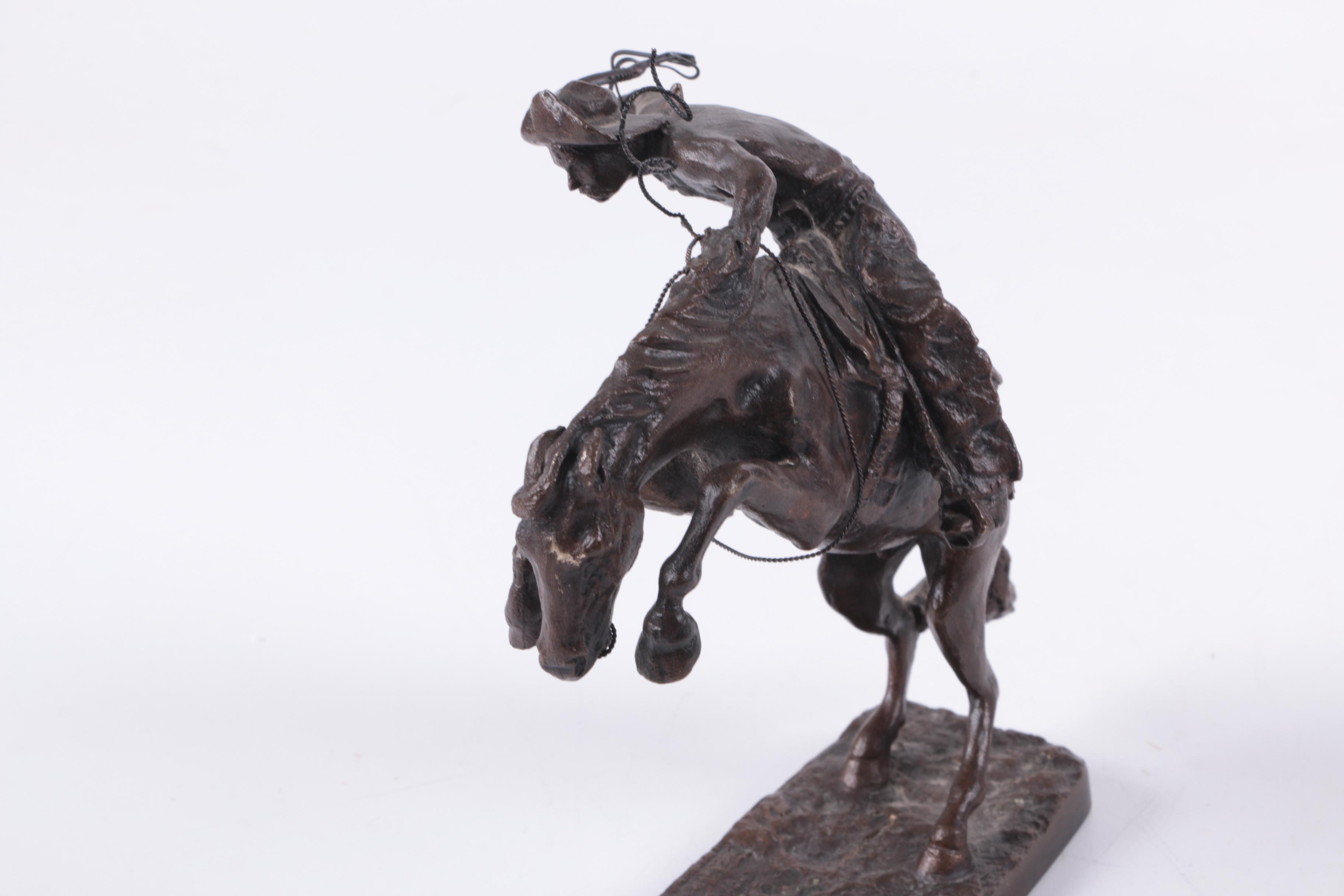 "The Bronco Buster" Horse Figurine