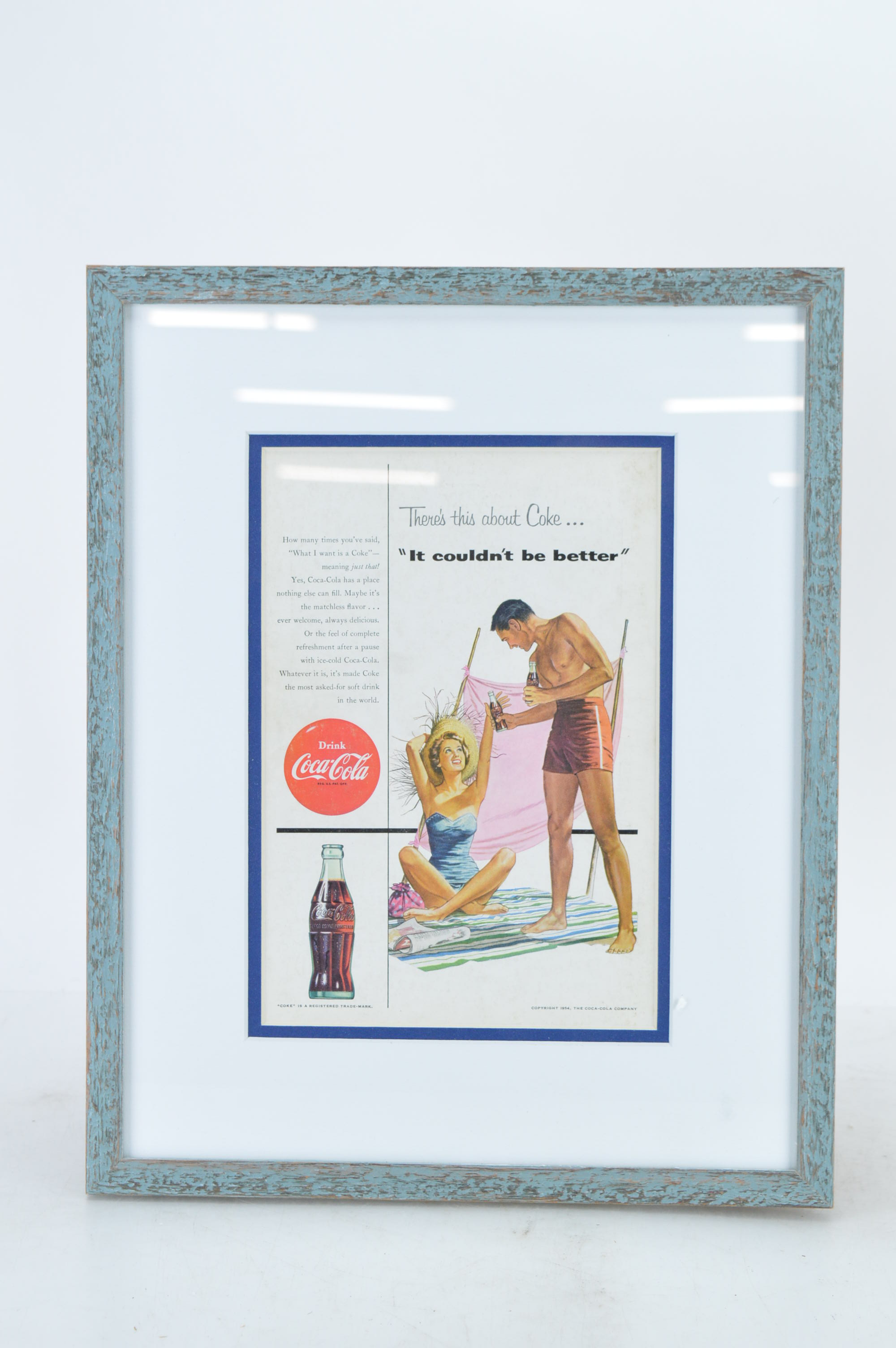 1954 Frame Coca-Cola Advertisement