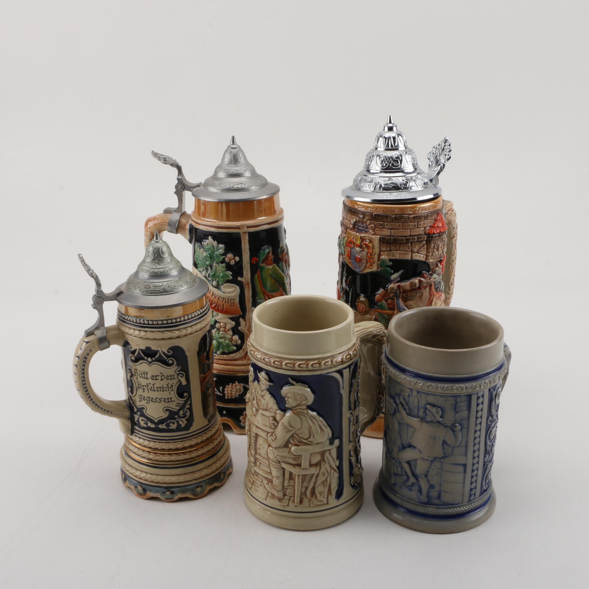 Collection of Steins and Stein-Shaped Music Boxes