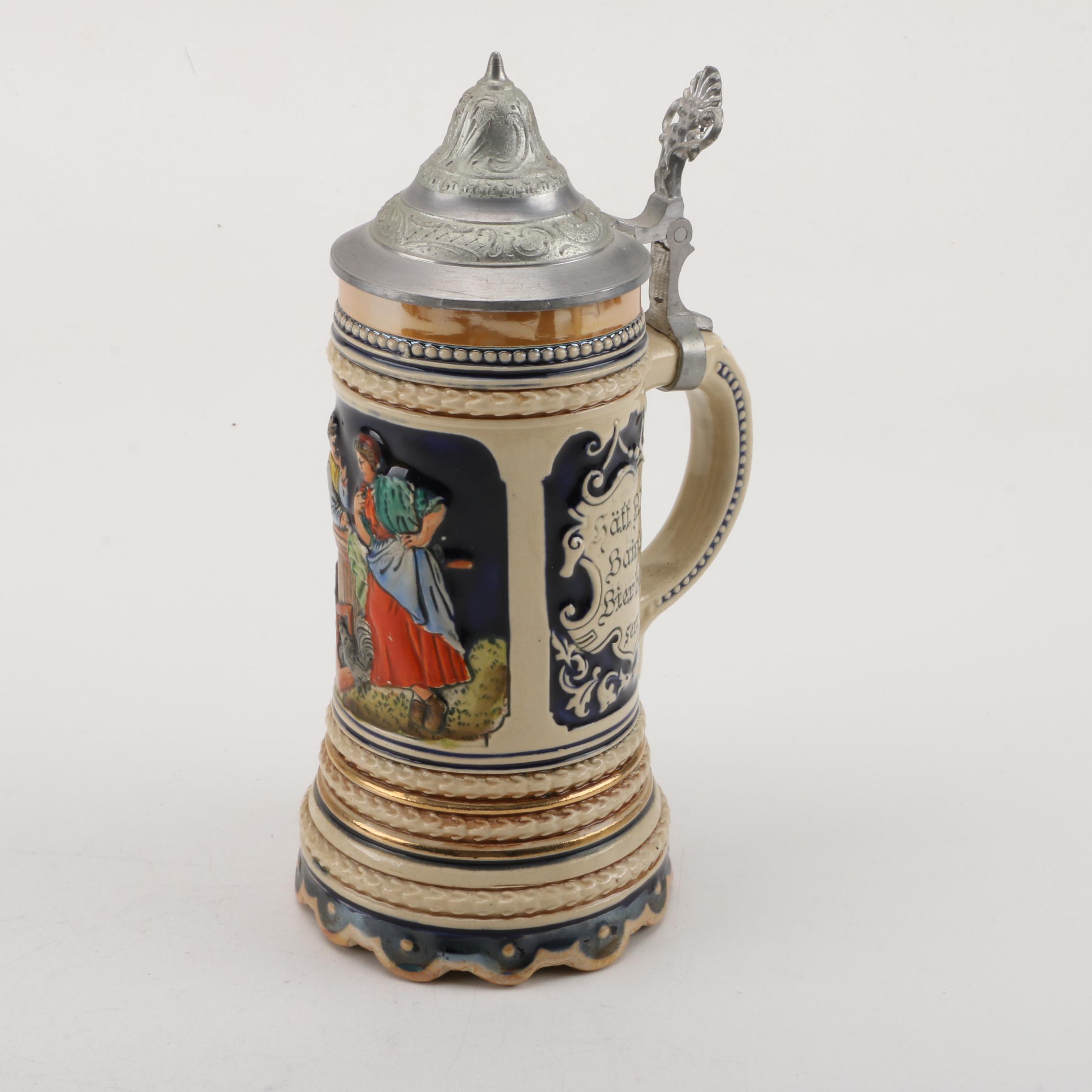 Collection of Steins and Stein-Shaped Music Boxes
