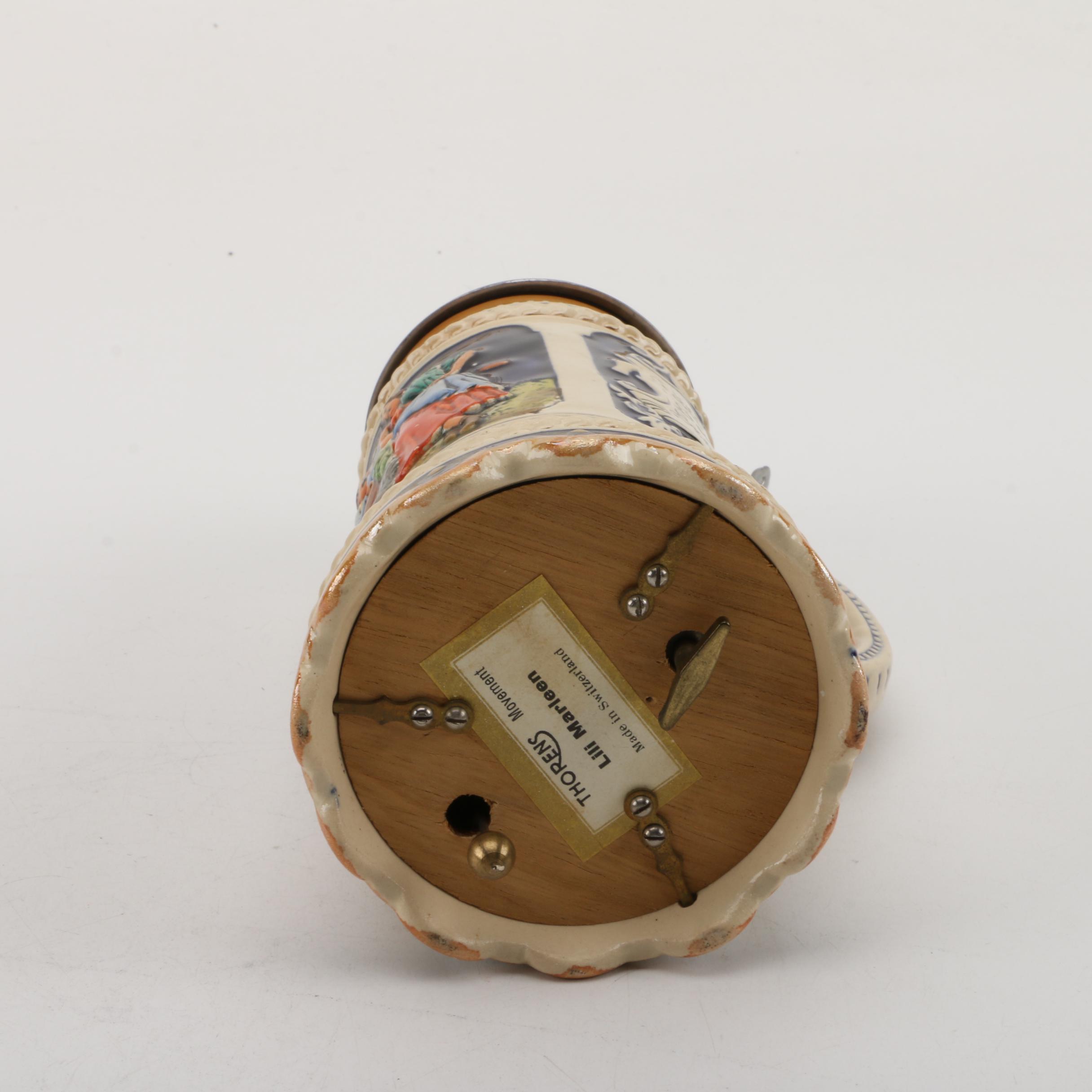 Collection of Steins and Stein-Shaped Music Boxes